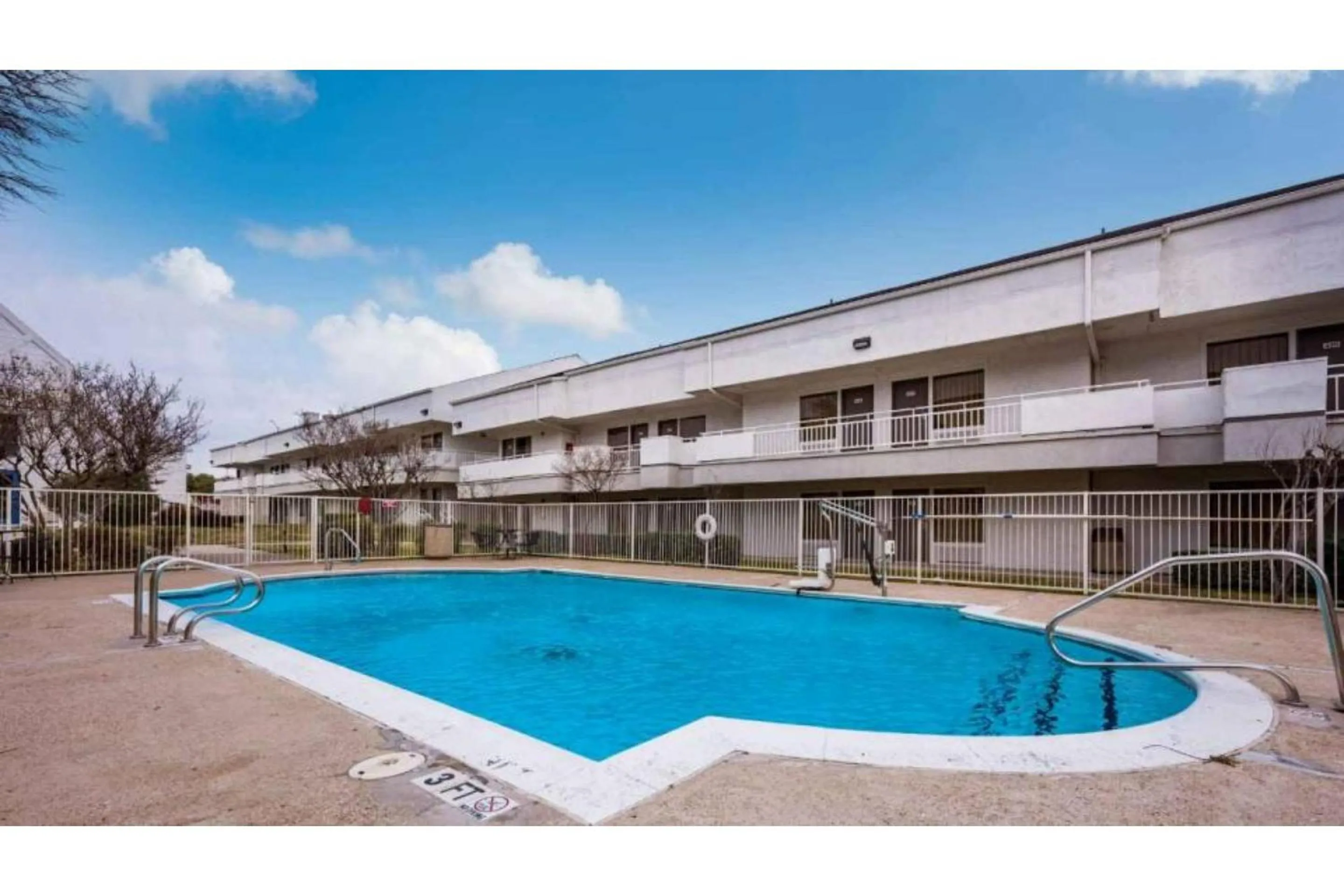 Swimming pool in Studio 6 Irving, TX - Irving DFW Airport East