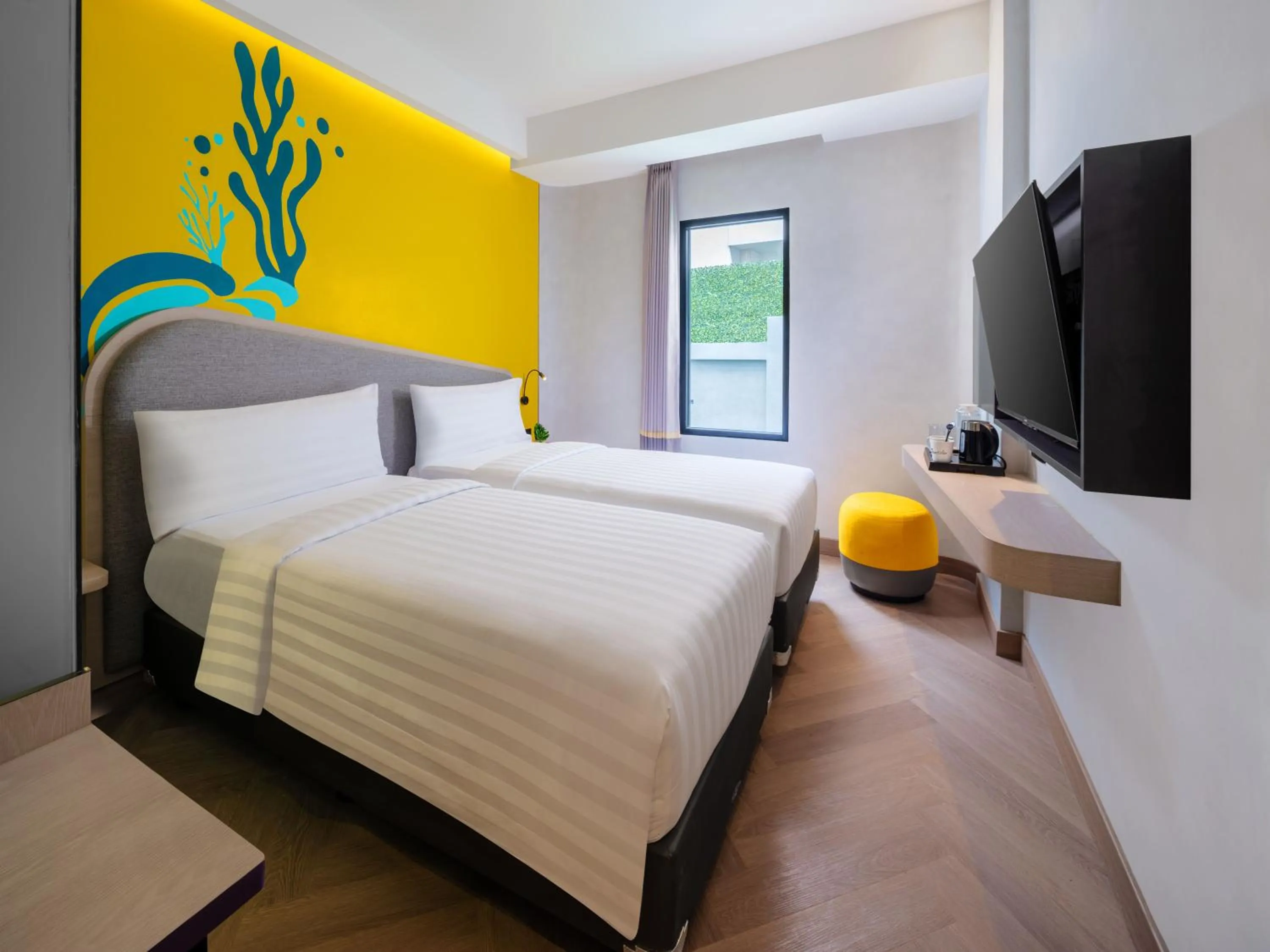Bed in Quest Vibe Dewi Sri Bali