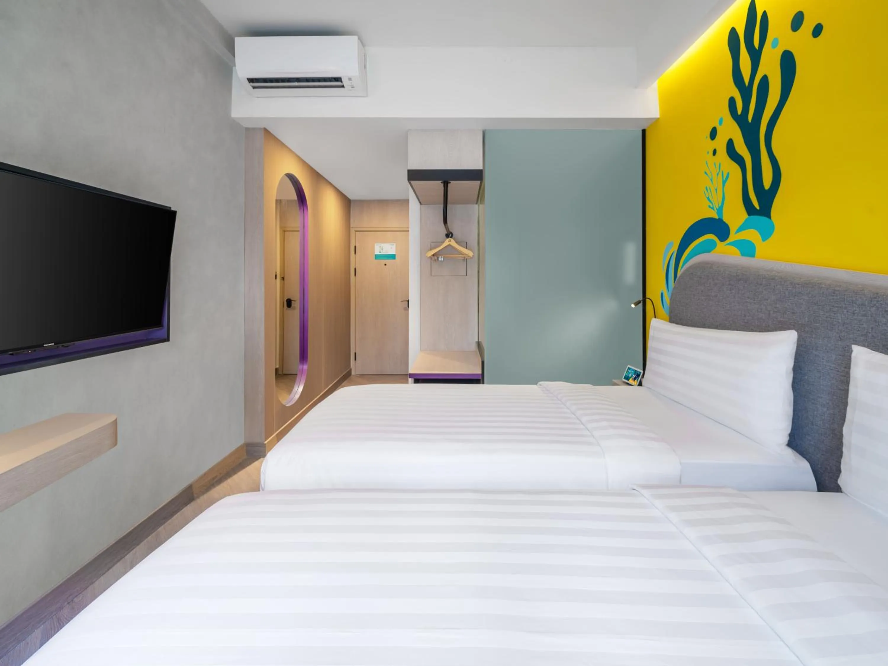 Bed in Quest Vibe Dewi Sri Bali