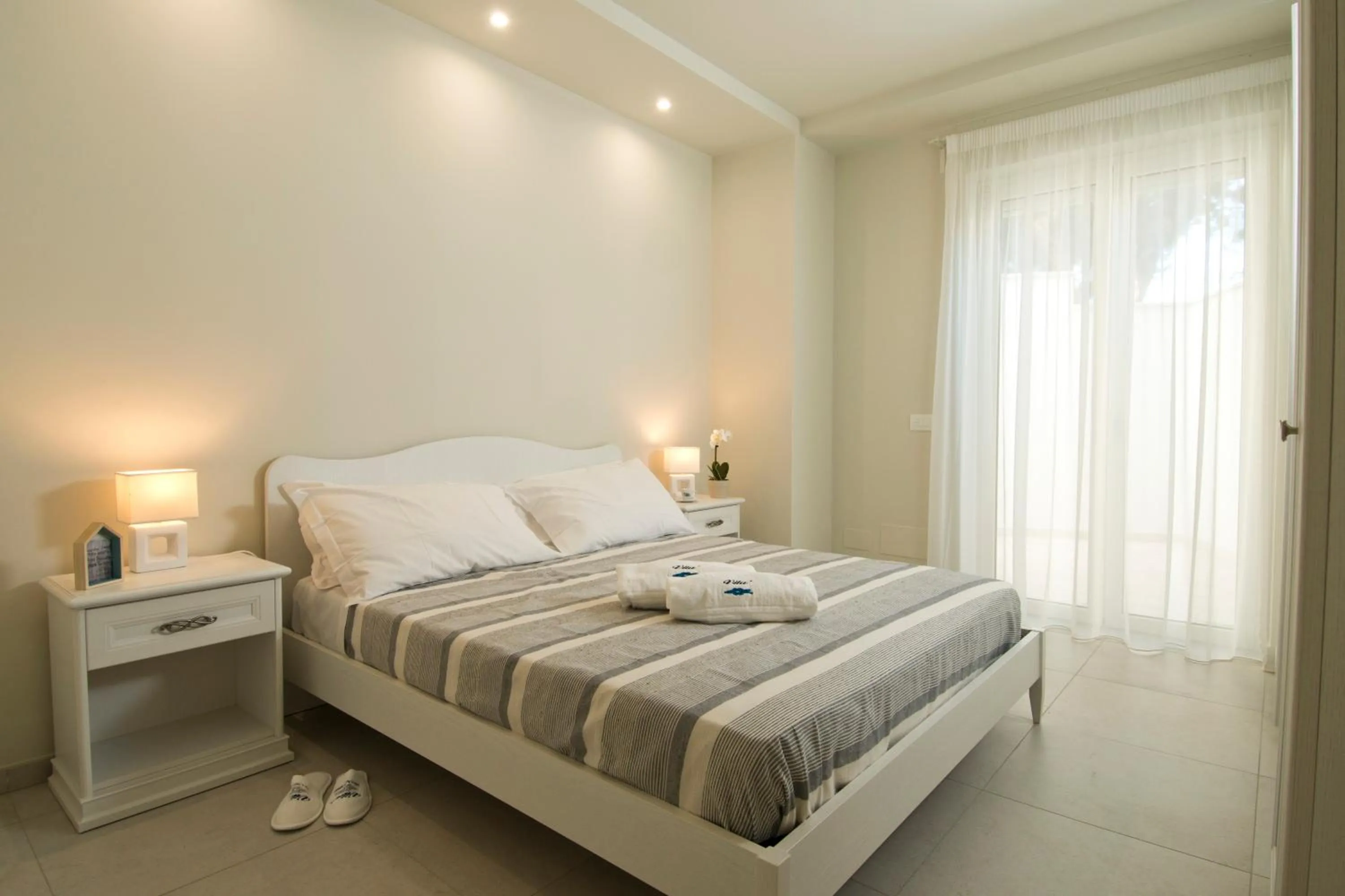 Bedroom, Bed in Vilu Suite Mare