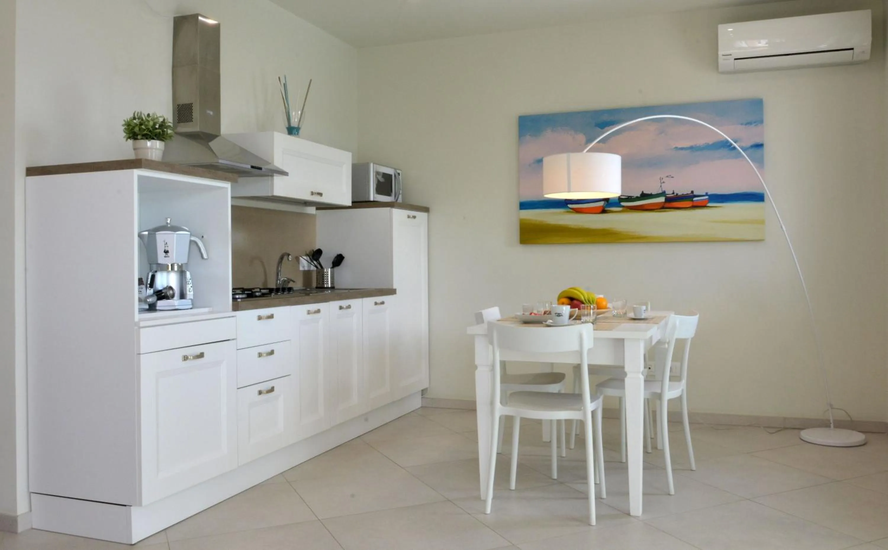 Kitchen or kitchenette in Vilu Suite Mare