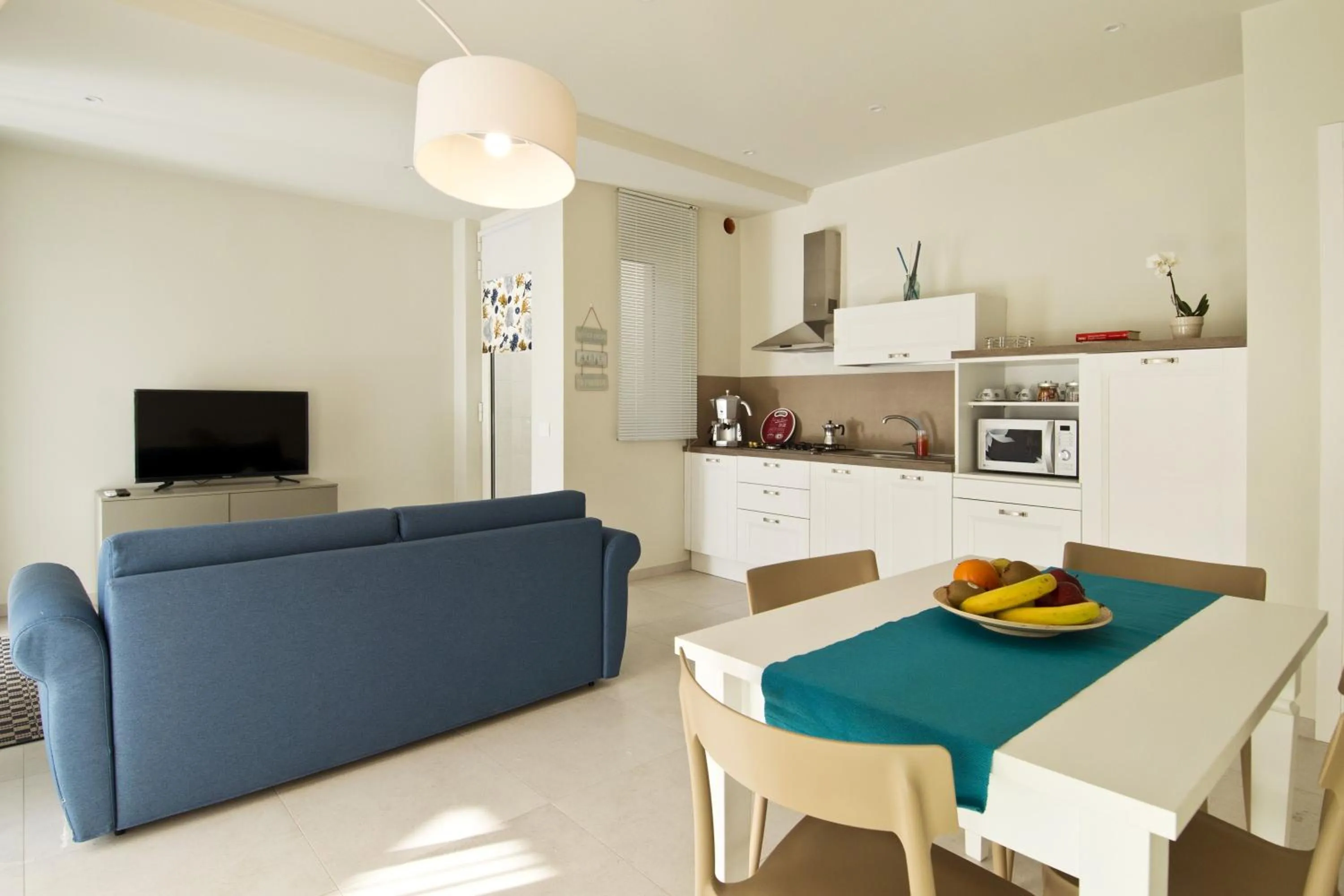 Kitchen or kitchenette in Vilu Suite Mare