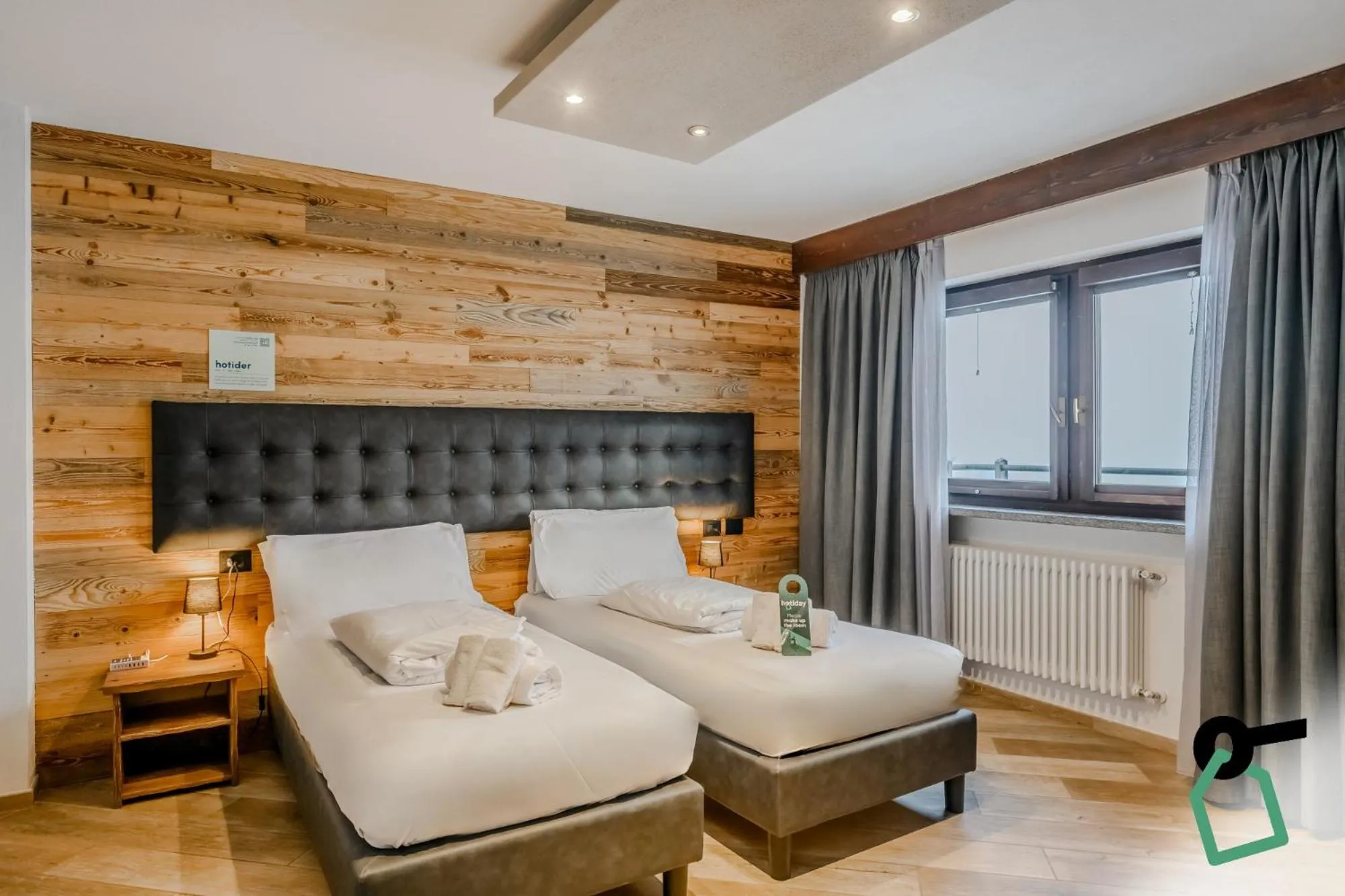 Photo of the whole room, Bed in Hotiday Sestriere Ski Run