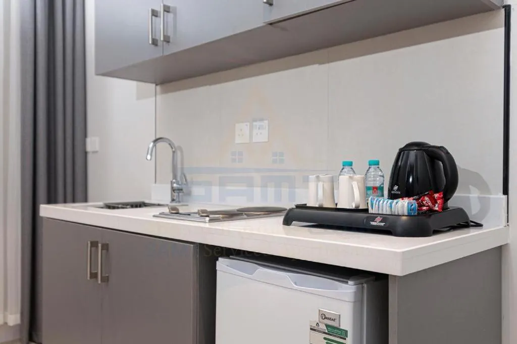 Kitchen or kitchenette in Lameek Serviced Apartments