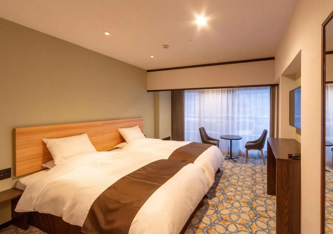 Bed in Hotel Hanamaki