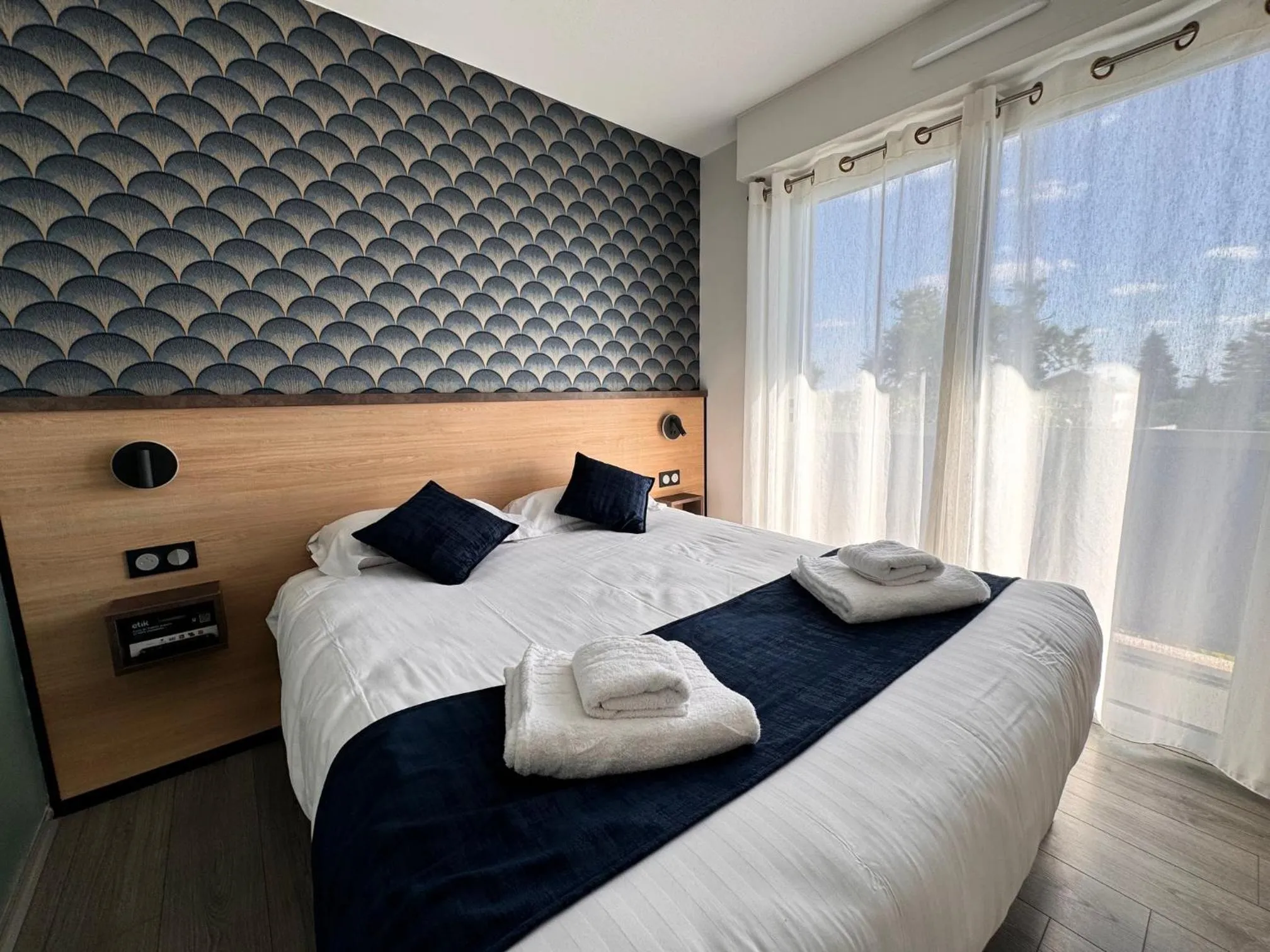 Photo of the whole room, Bed in Logis Hôtels Gnàc é Pause