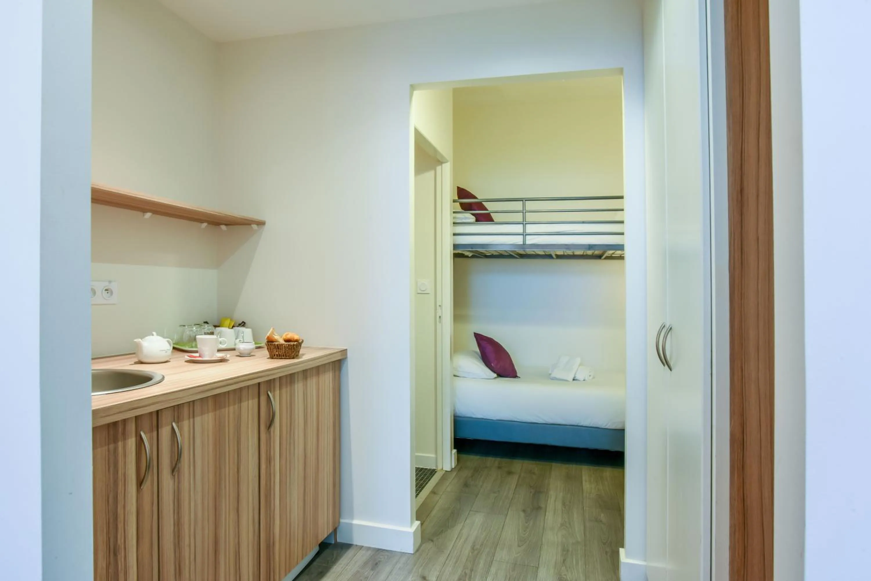 Bed in Logis Hôtels Gnàc é Pause