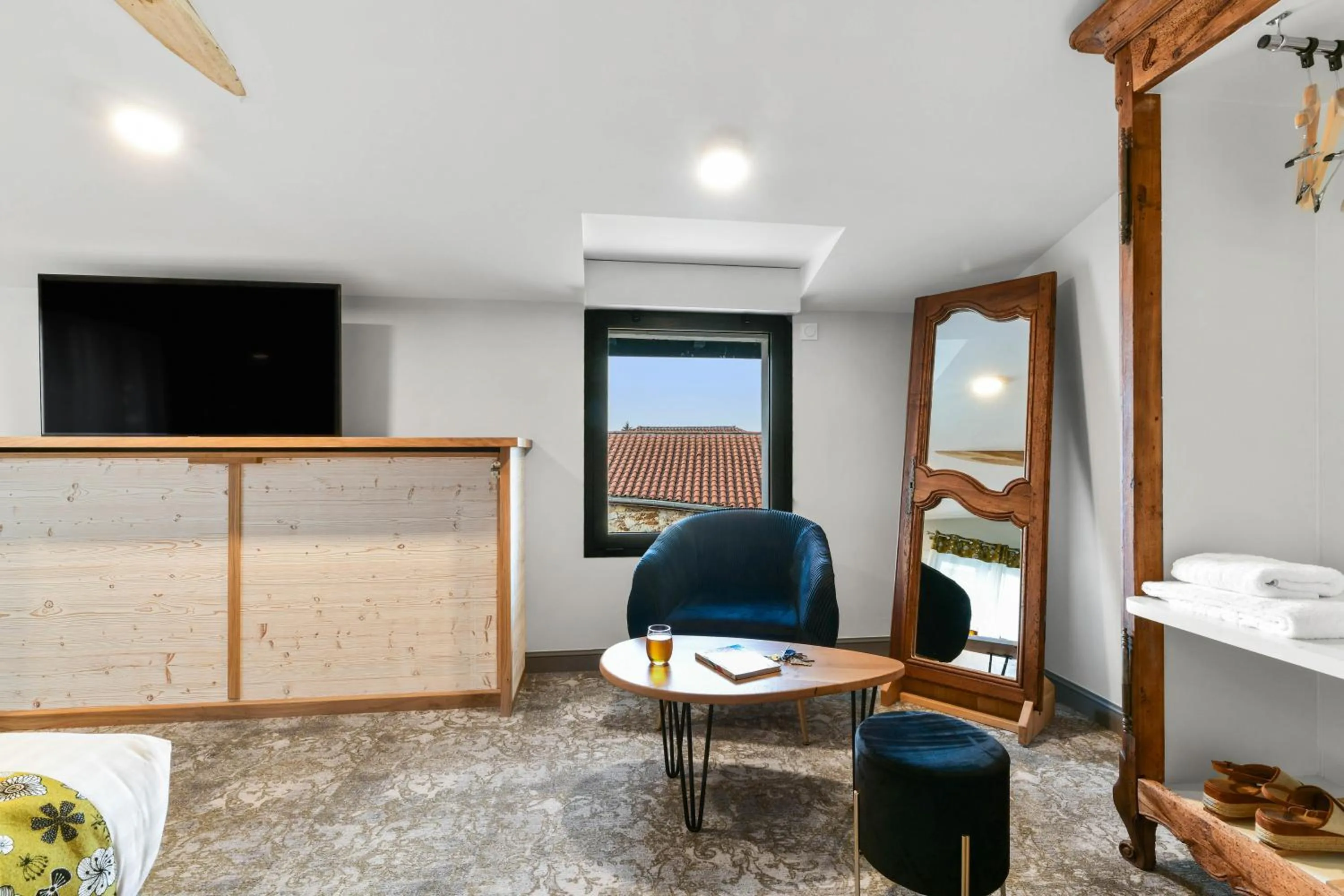 Living room in Logis Hôtels Gnàc é Pause