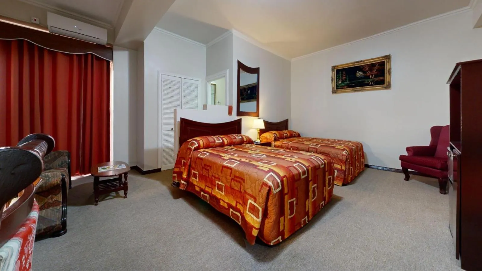 Photo of the whole room, Bed in Regency Suites Hotel