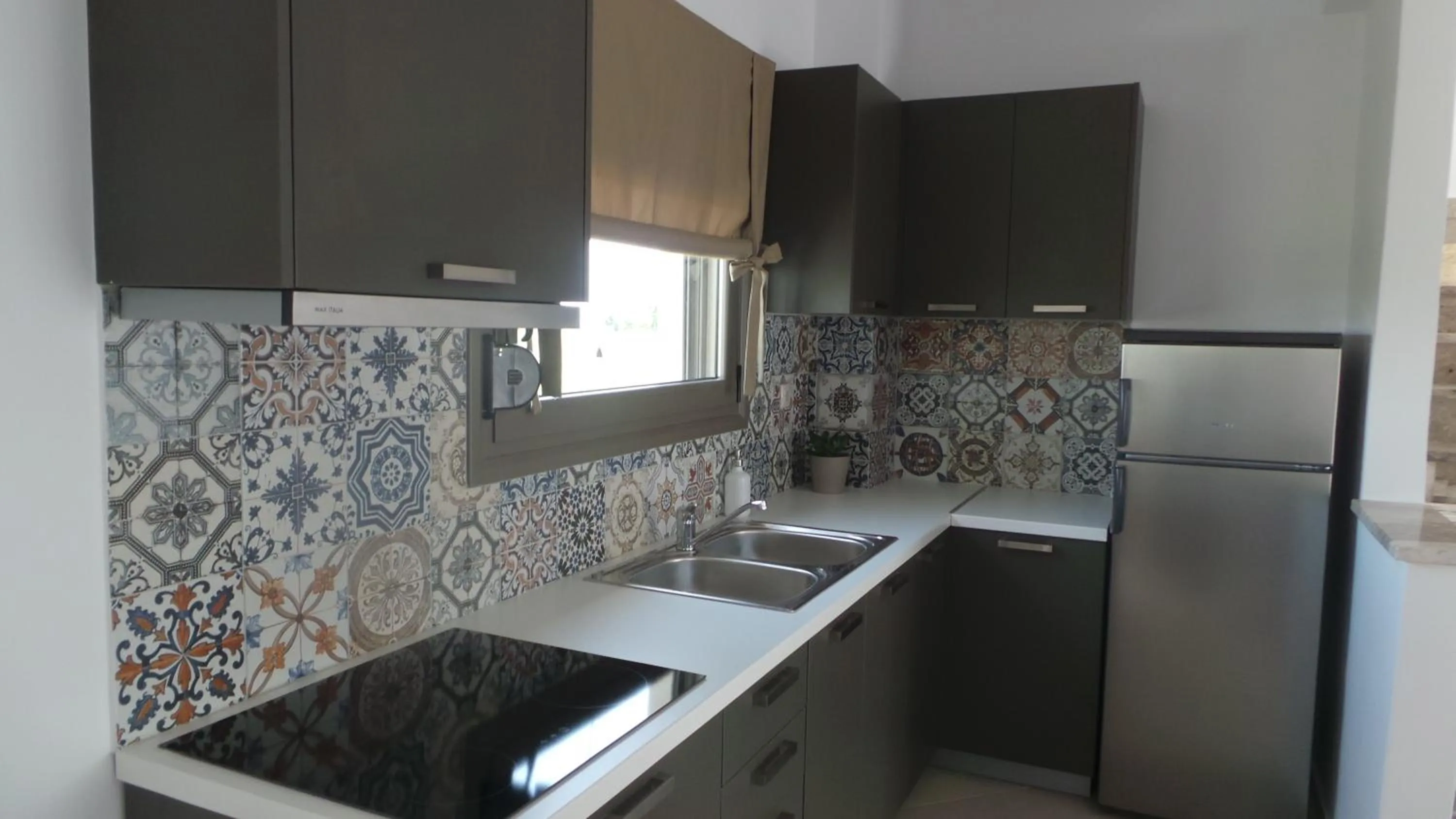 Kitchen or kitchenette in Niovi Boutique Apartments