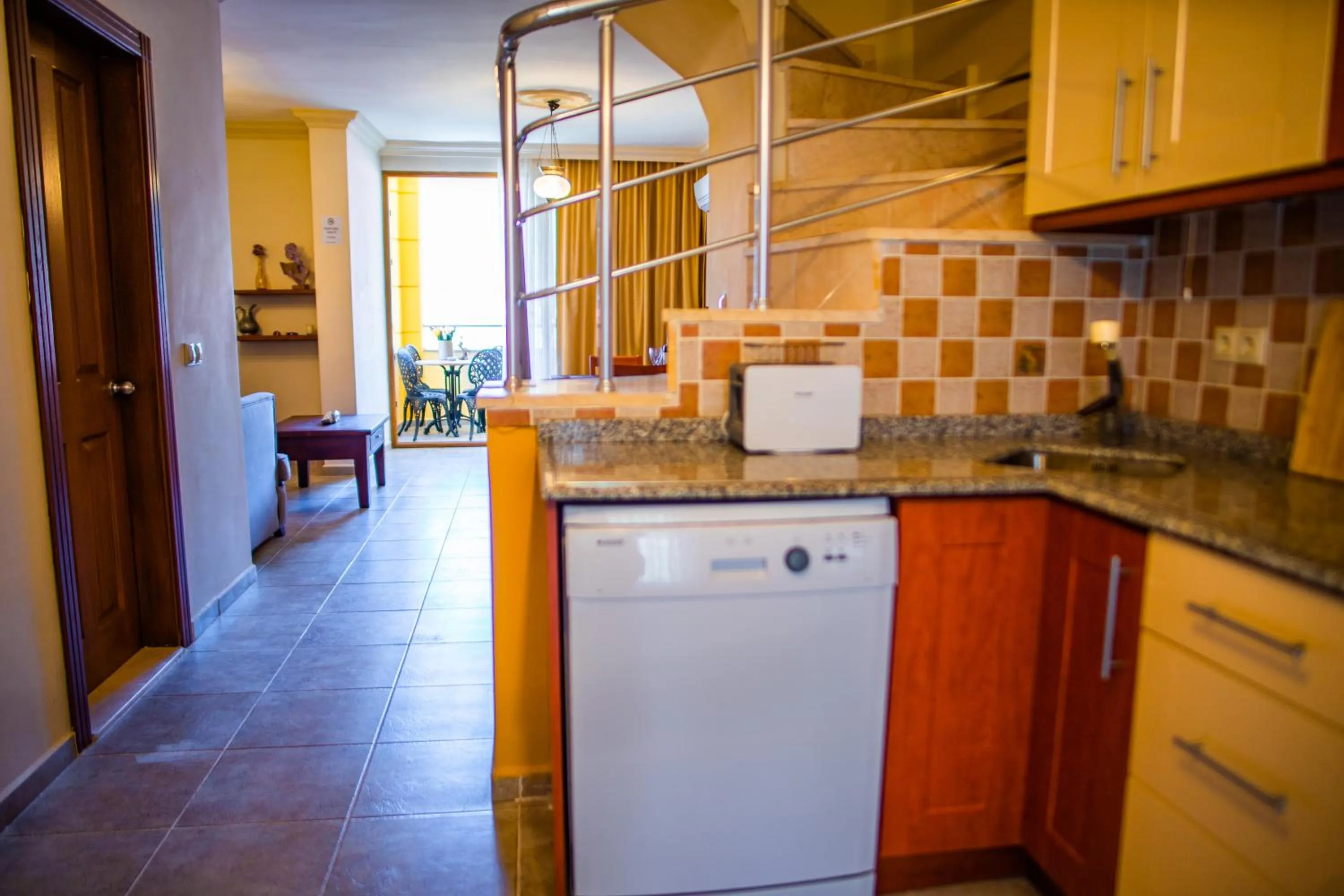 Kitchen or kitchenette in Dores Residence