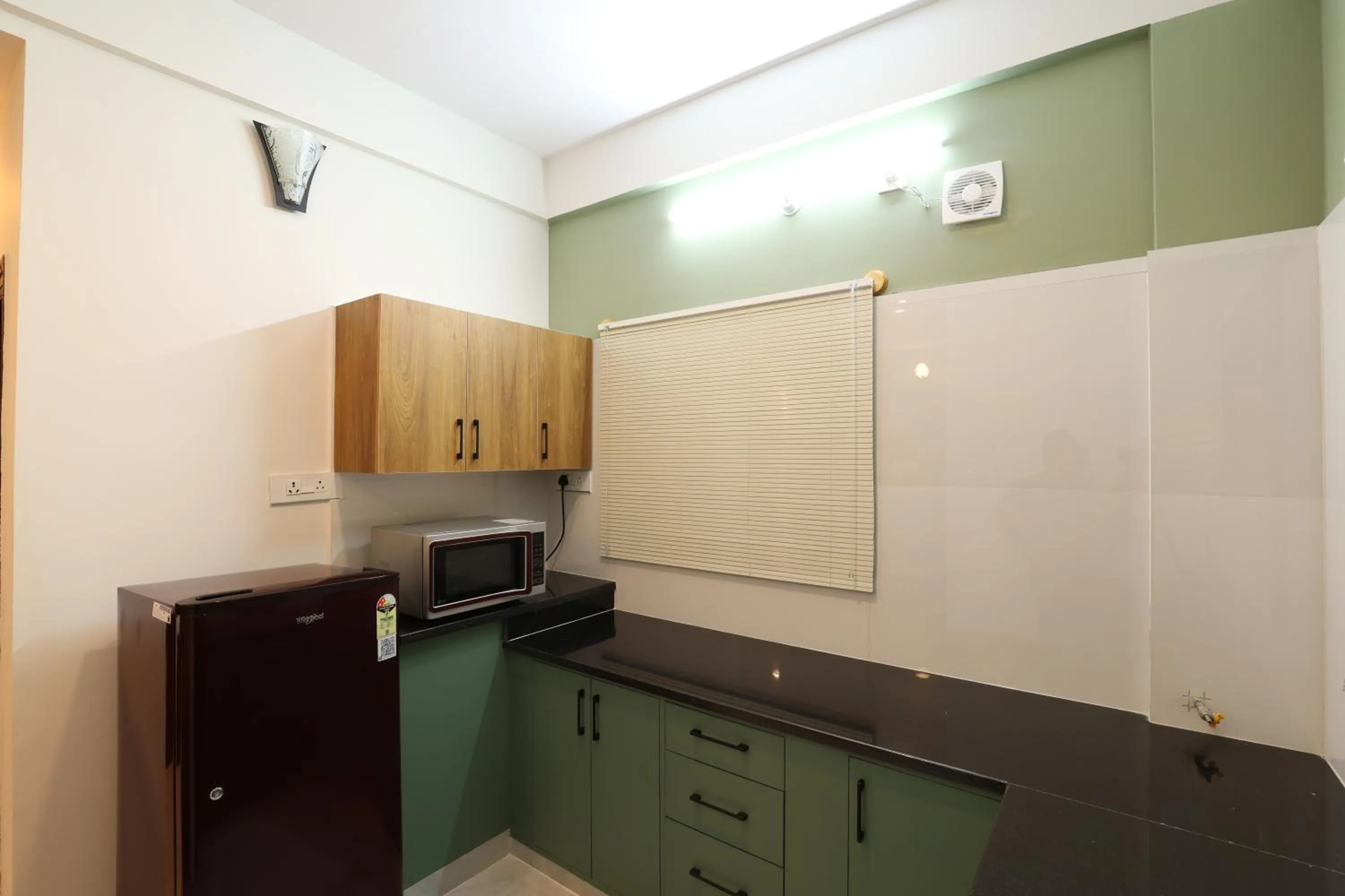 Kitchen or kitchenette in Olivette Suites