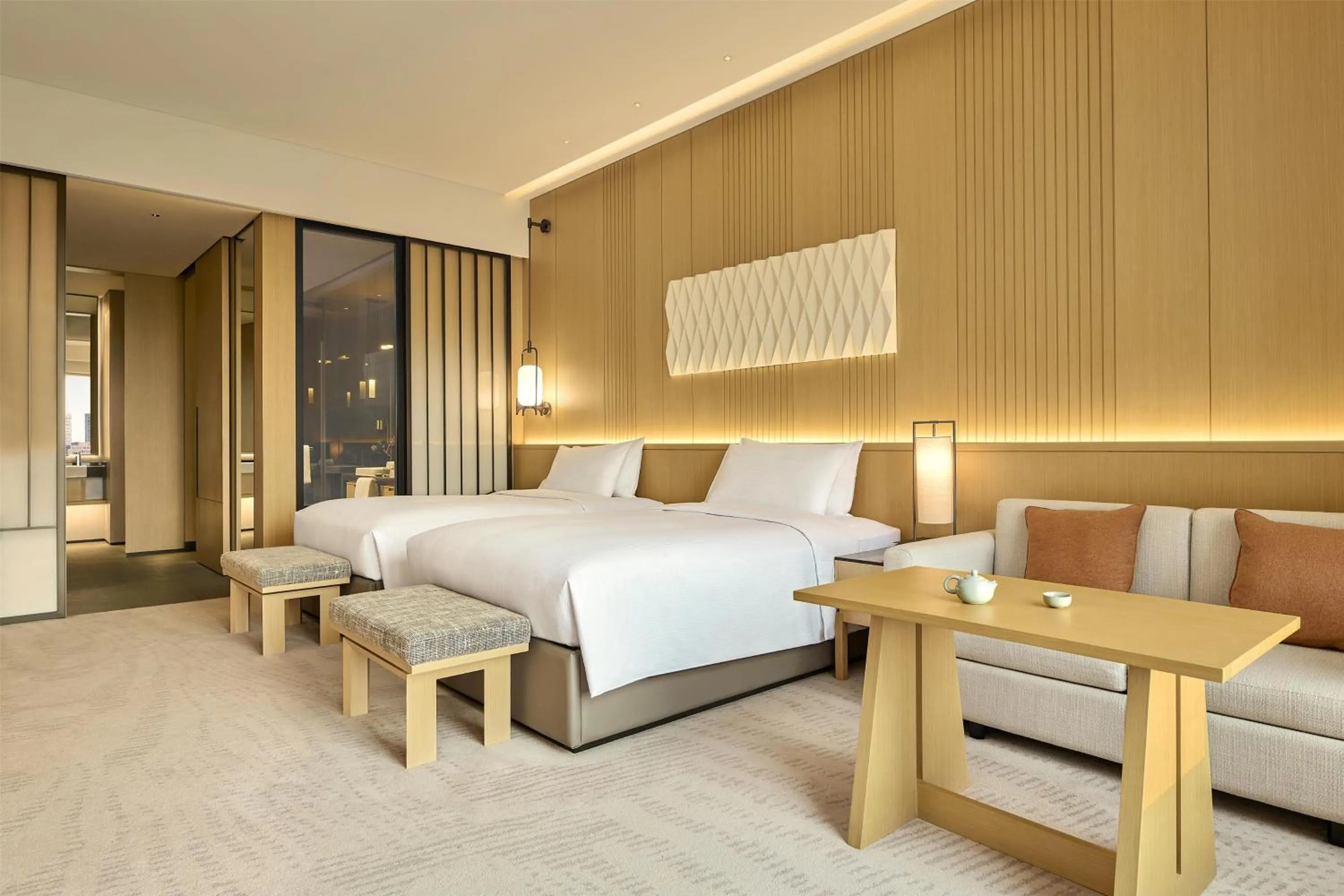 Bed in Secan Hotel Qingdao, Curio Collection By Hilton