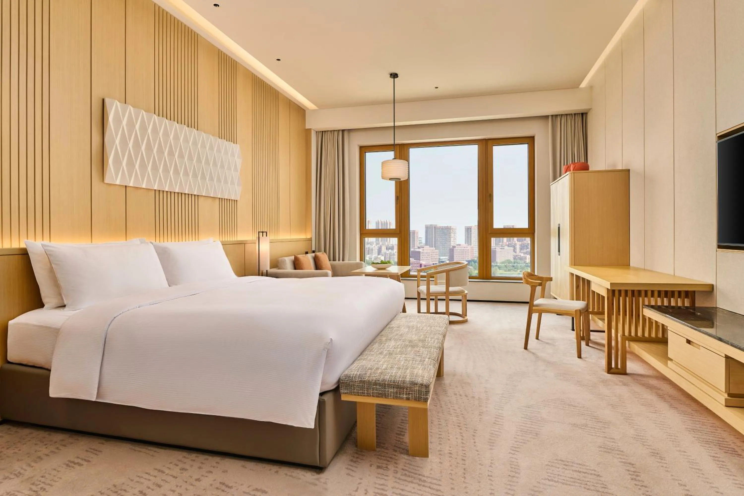 Photo of the whole room, Bed in Secan Hotel Qingdao, Curio Collection By Hilton