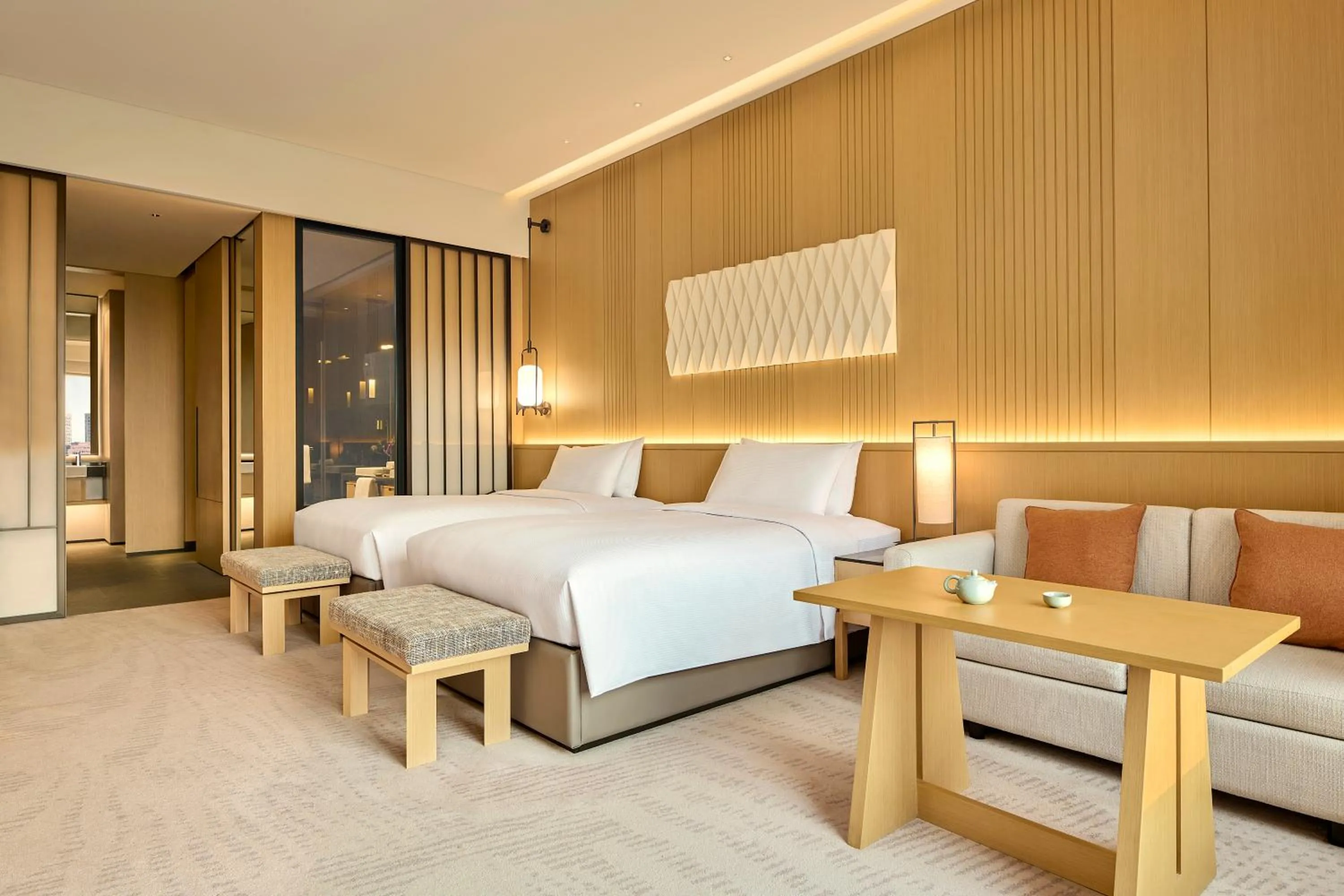 Bed in Secan Hotel Qingdao, Curio Collection By Hilton