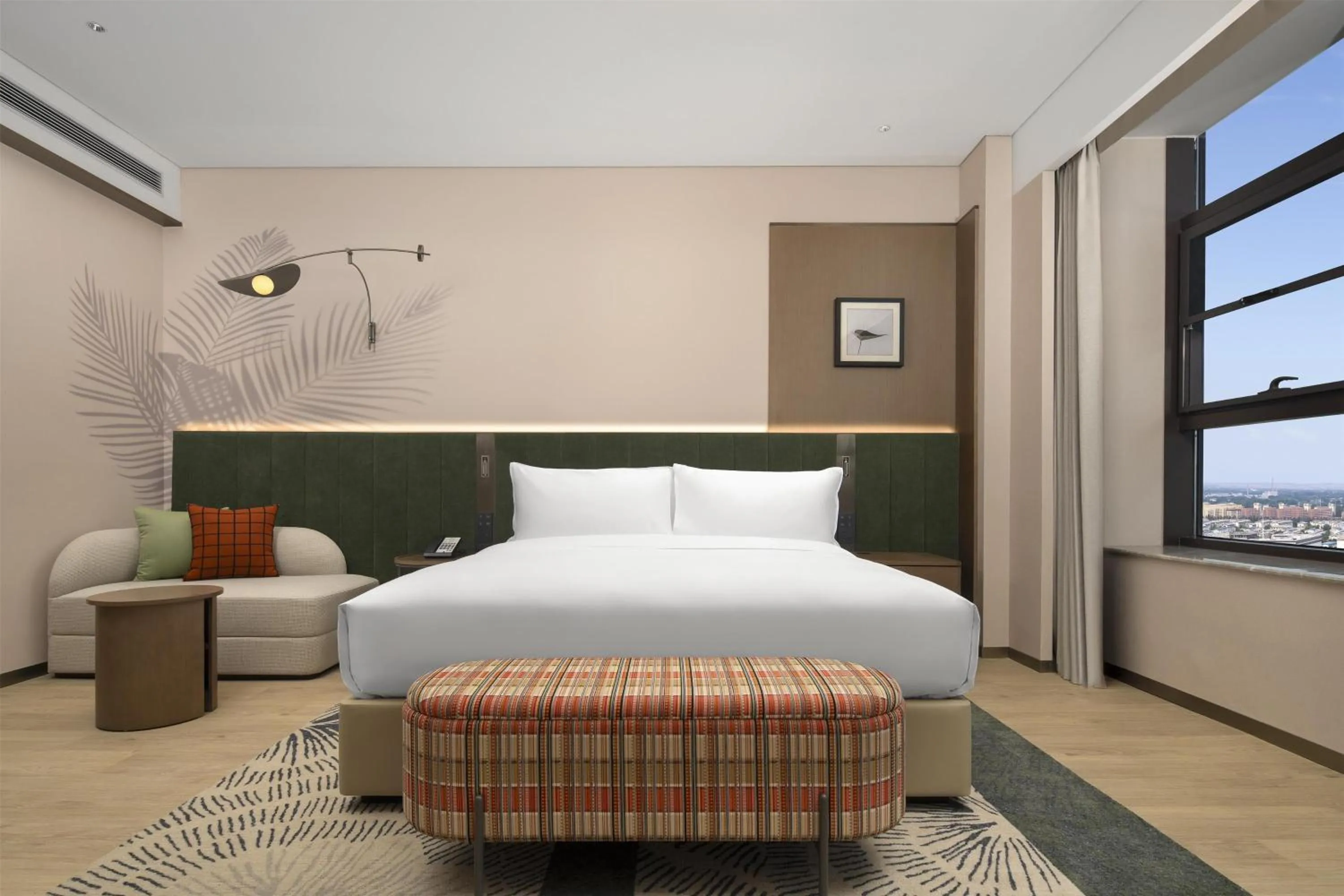 Living room, Bed in Hilton Garden Inn Zhongwei Shapotou