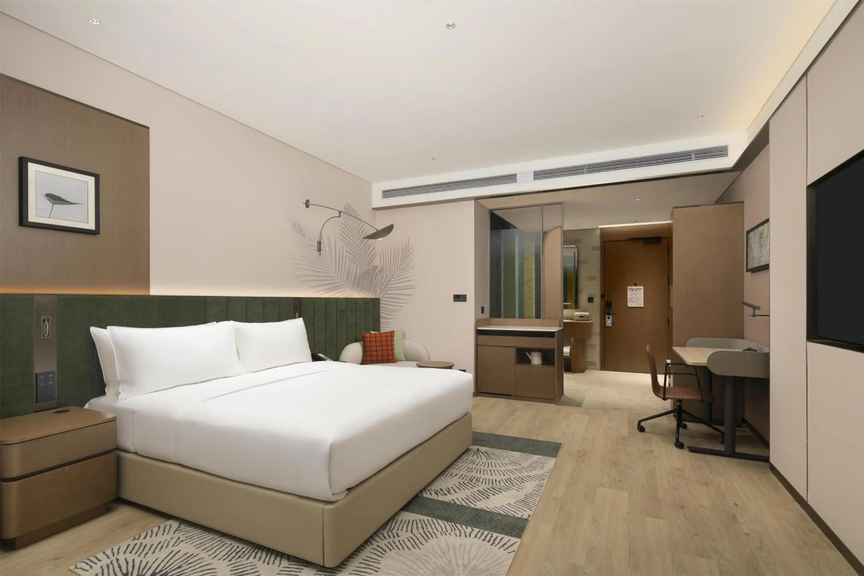 Living room, Bed in Hilton Garden Inn Zhongwei Shapotou