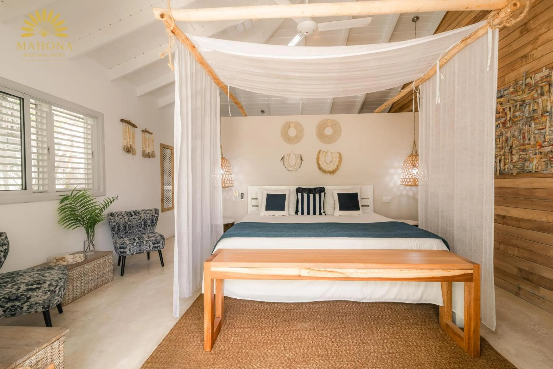 Bed in Mahona Boutique Hotel