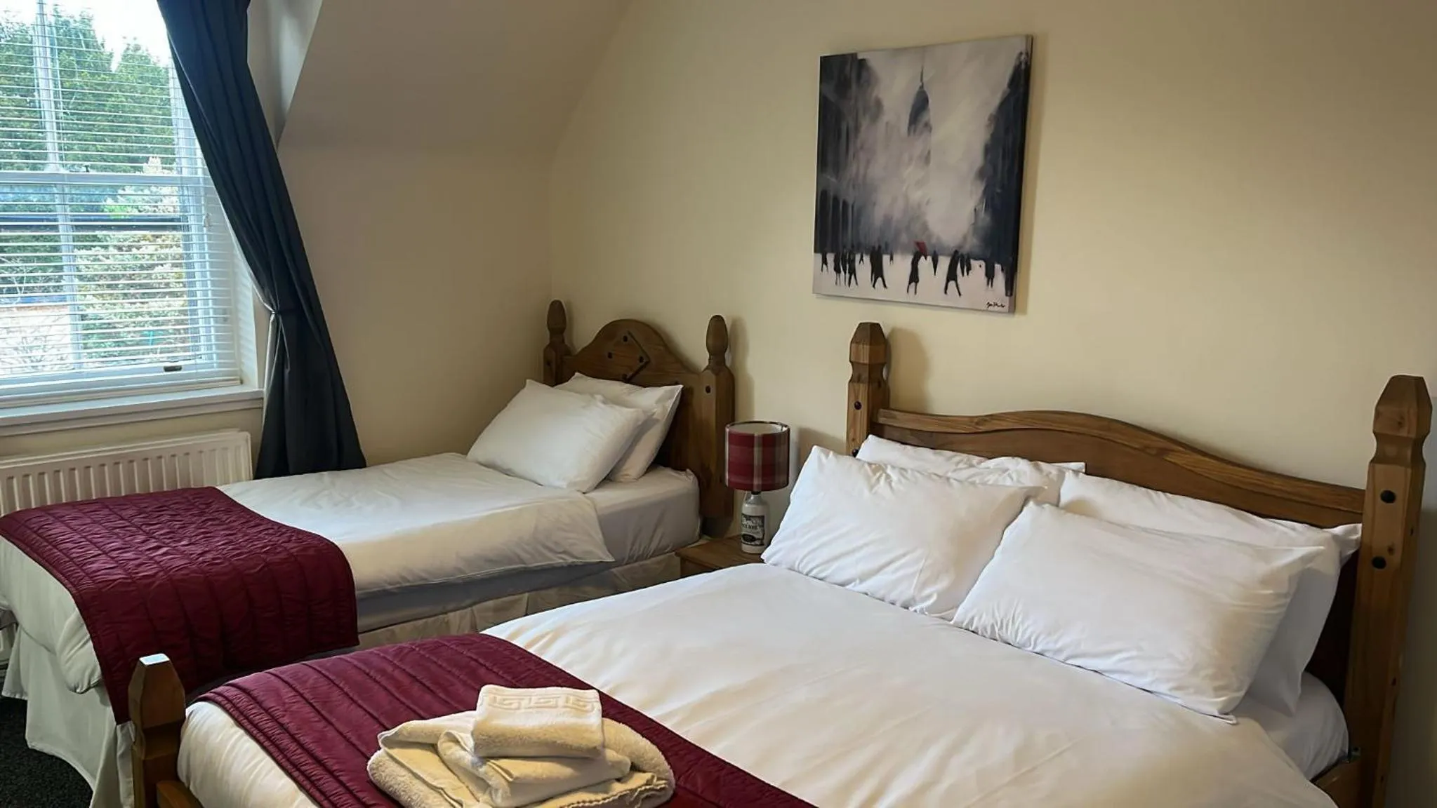 Bed in Novar Arms Hotel