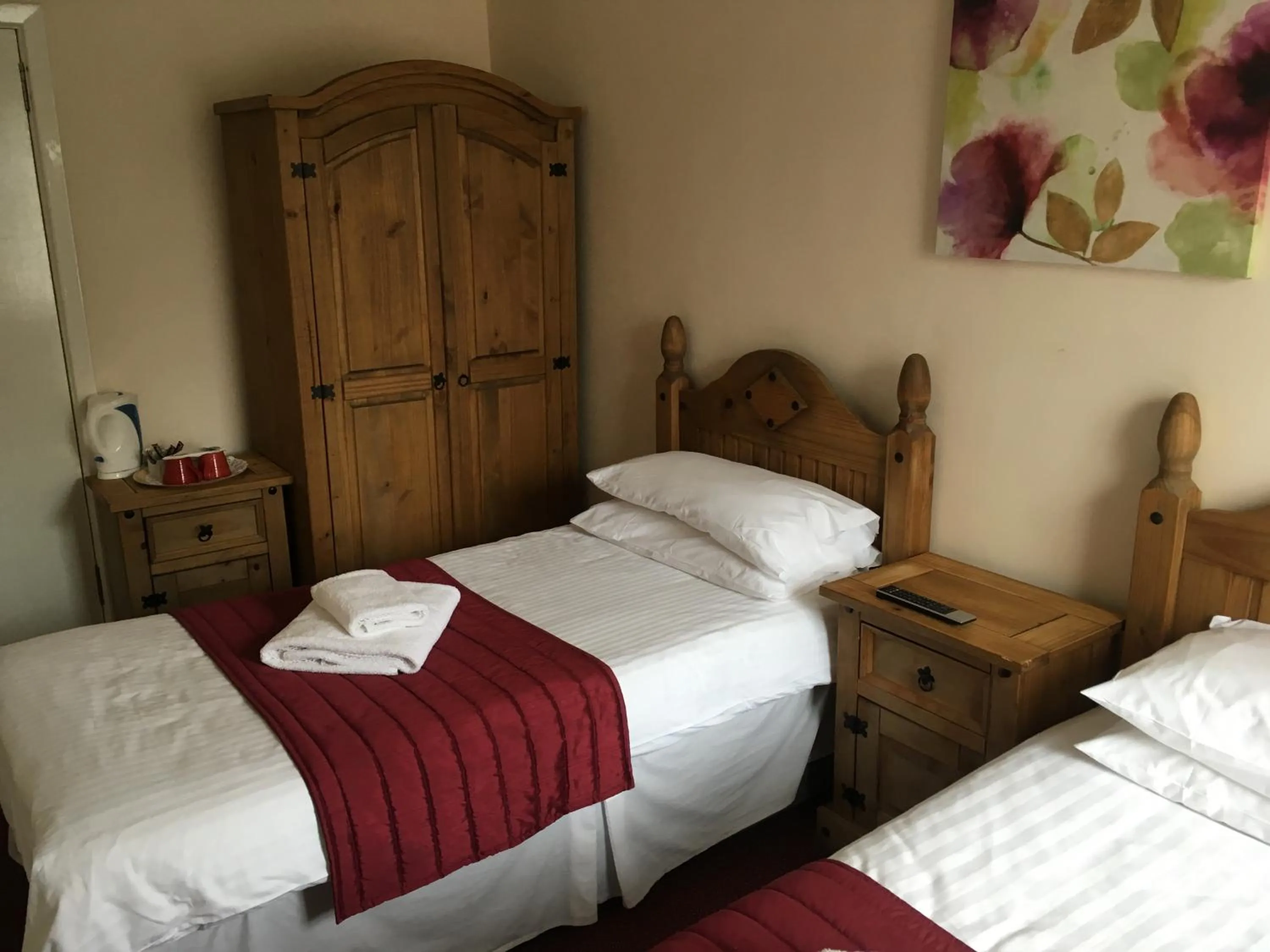 Bed in Novar Arms Hotel