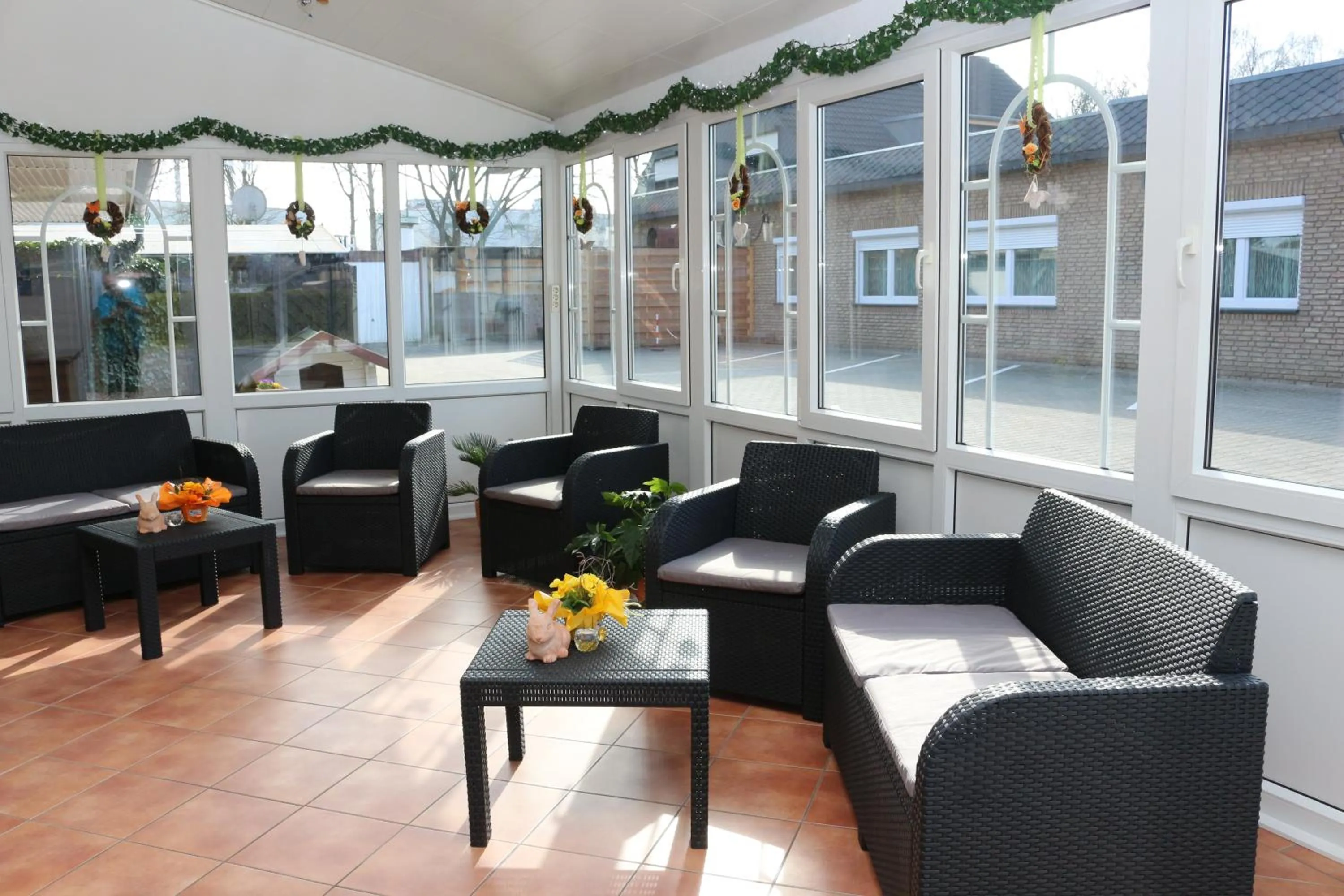 Communal lounge/ TV room in Hotel Baldus