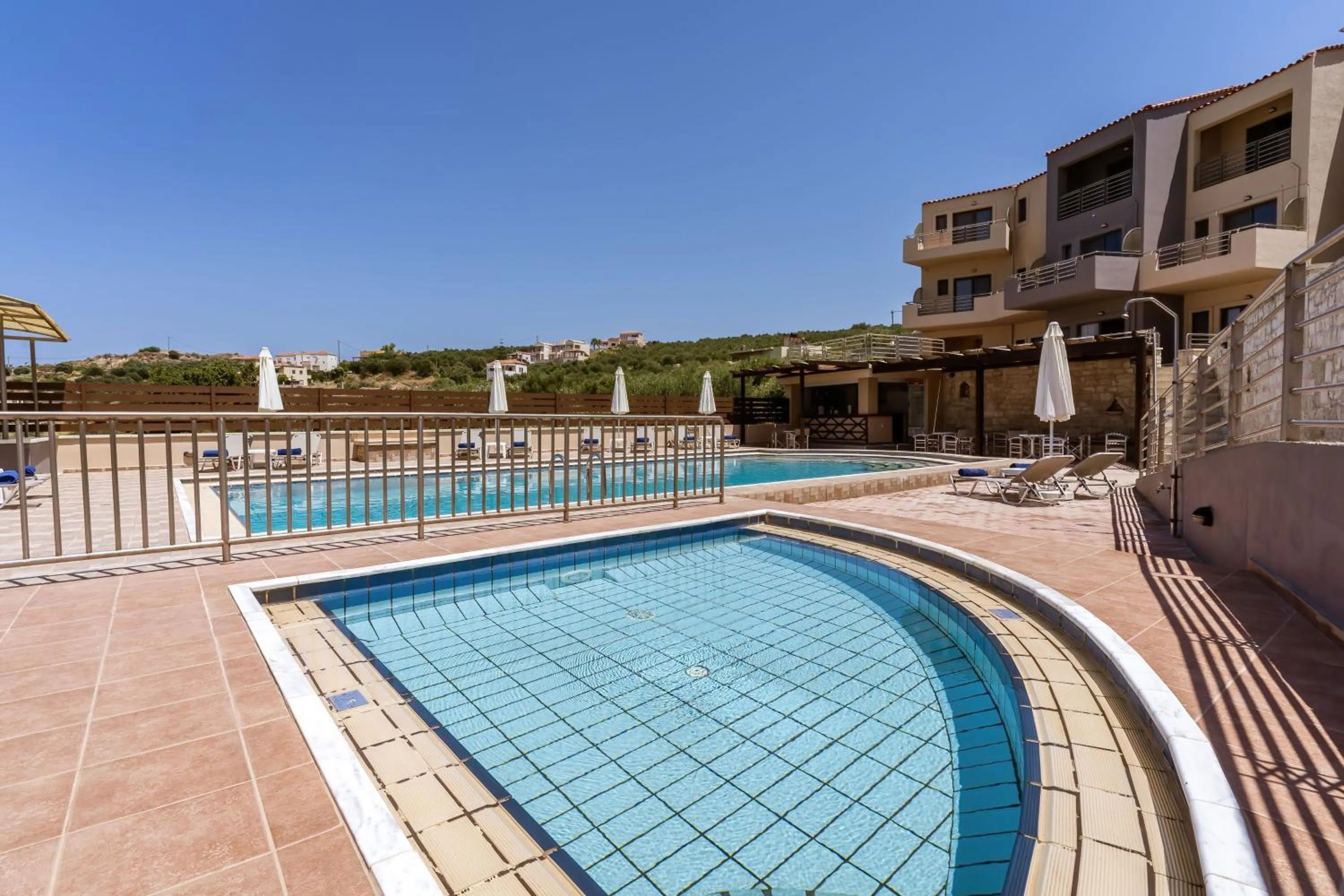Swimming pool in Sunrise Suites & Apartments