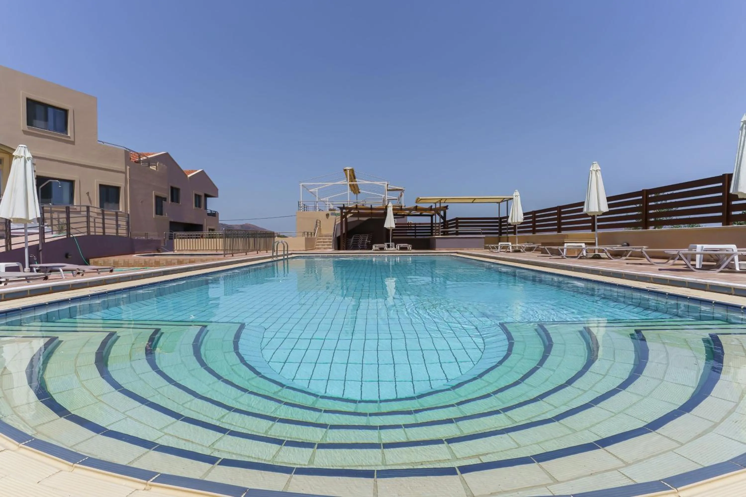 Swimming pool in Sunrise Suites & Apartments