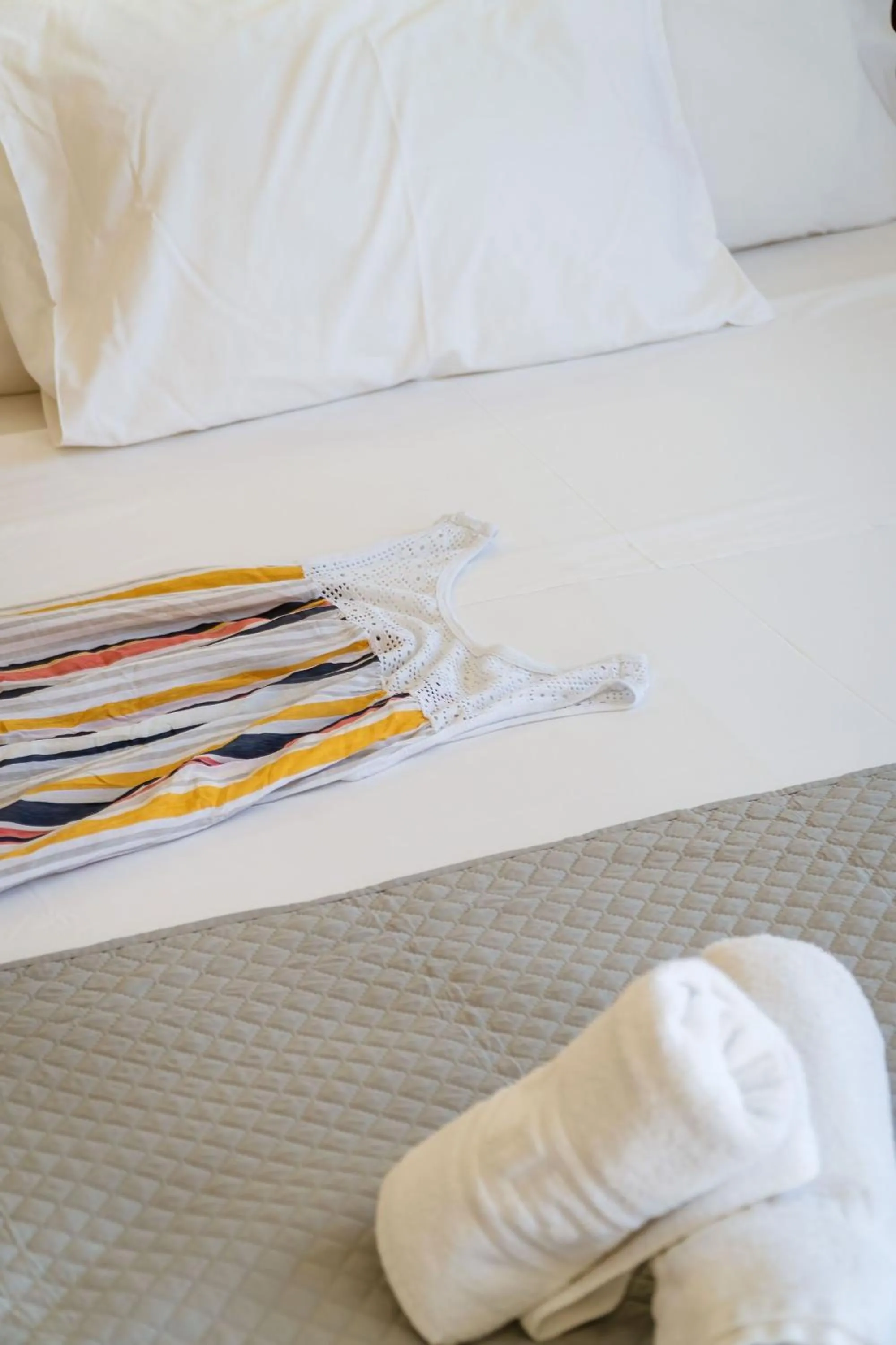 Bed in Sunrise Suites & Apartments