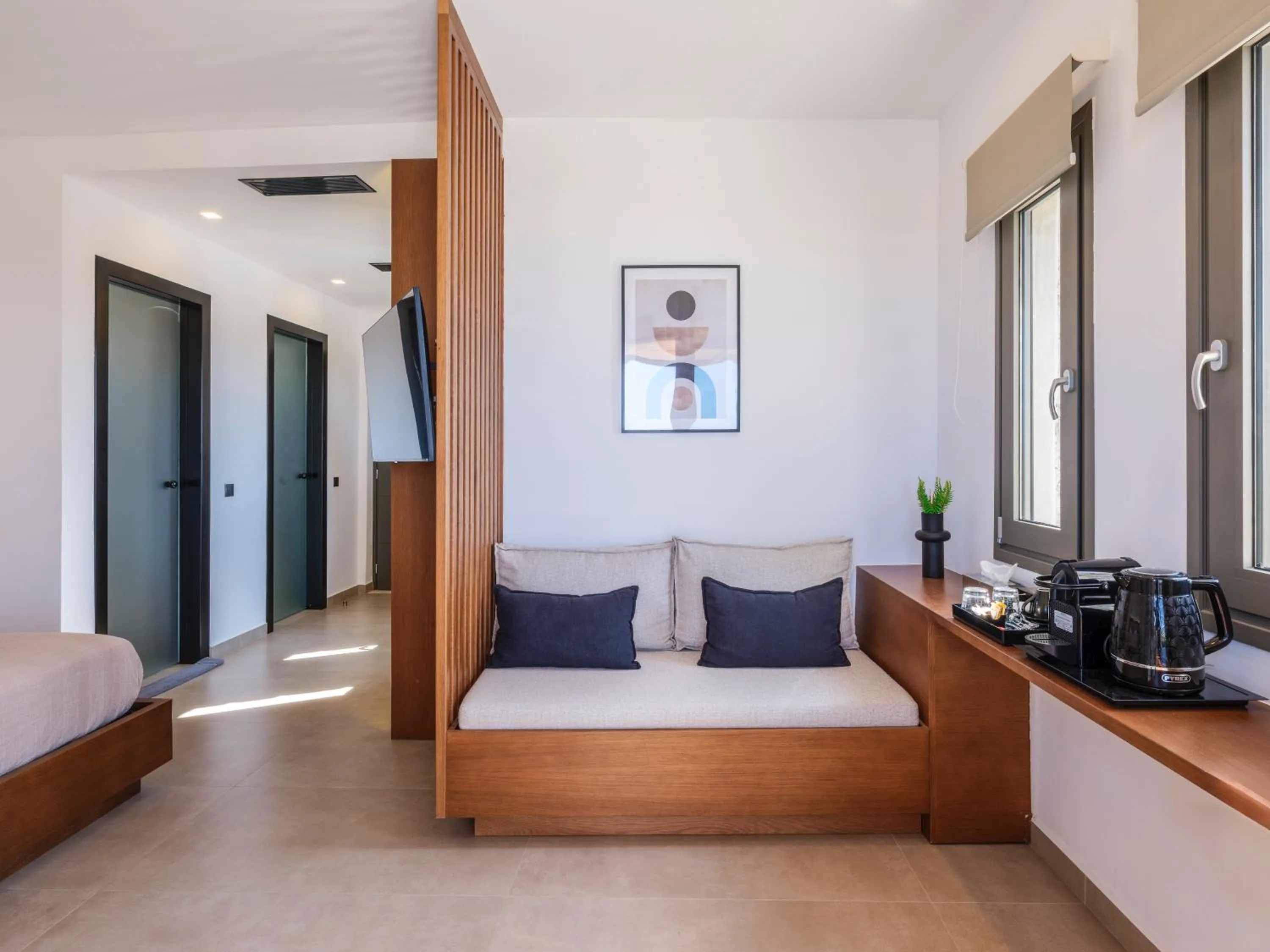 Living room, Bed in Evi Suites & Villas