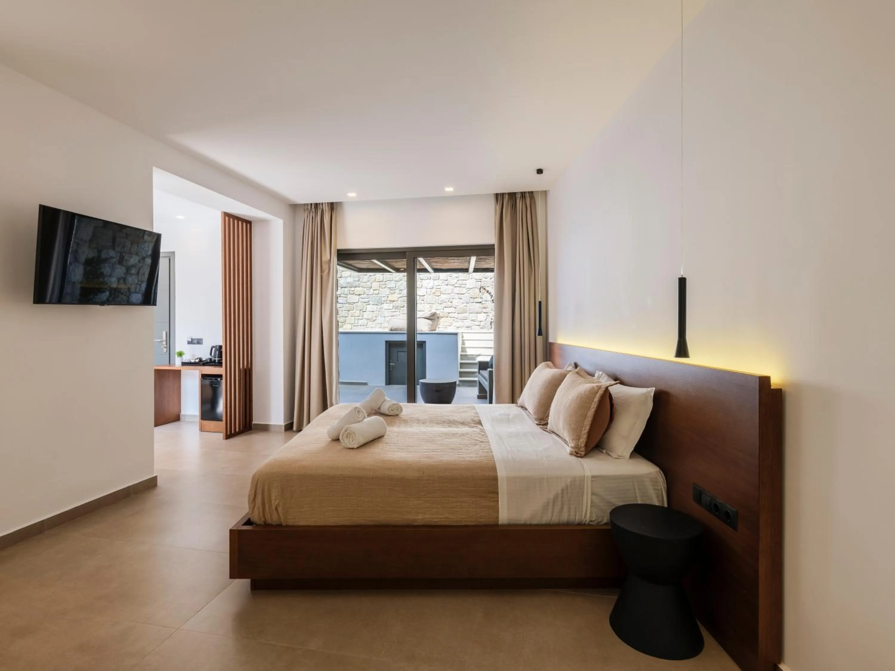 Communal lounge/ TV room, Bed in Evi Suites & Villas