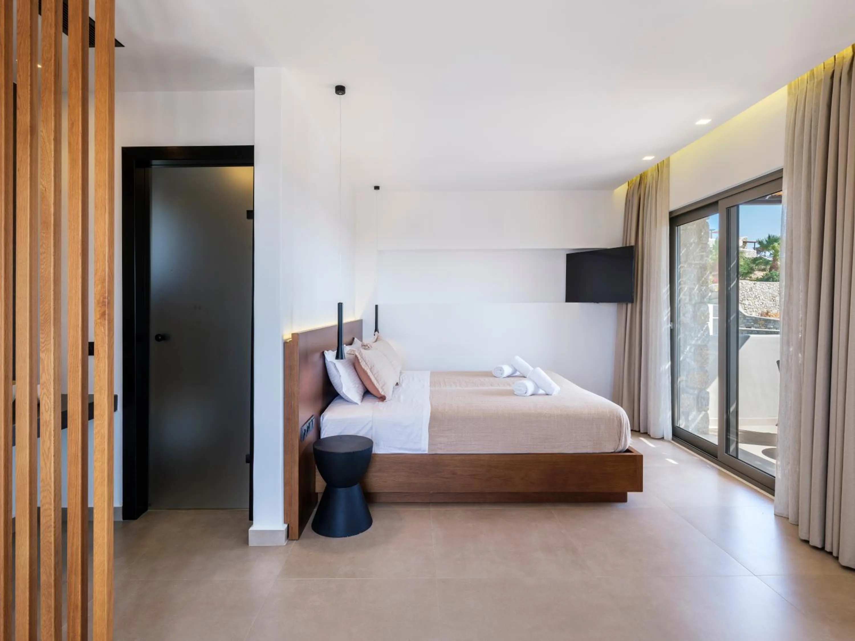 Bed in Evi Suites & Villas