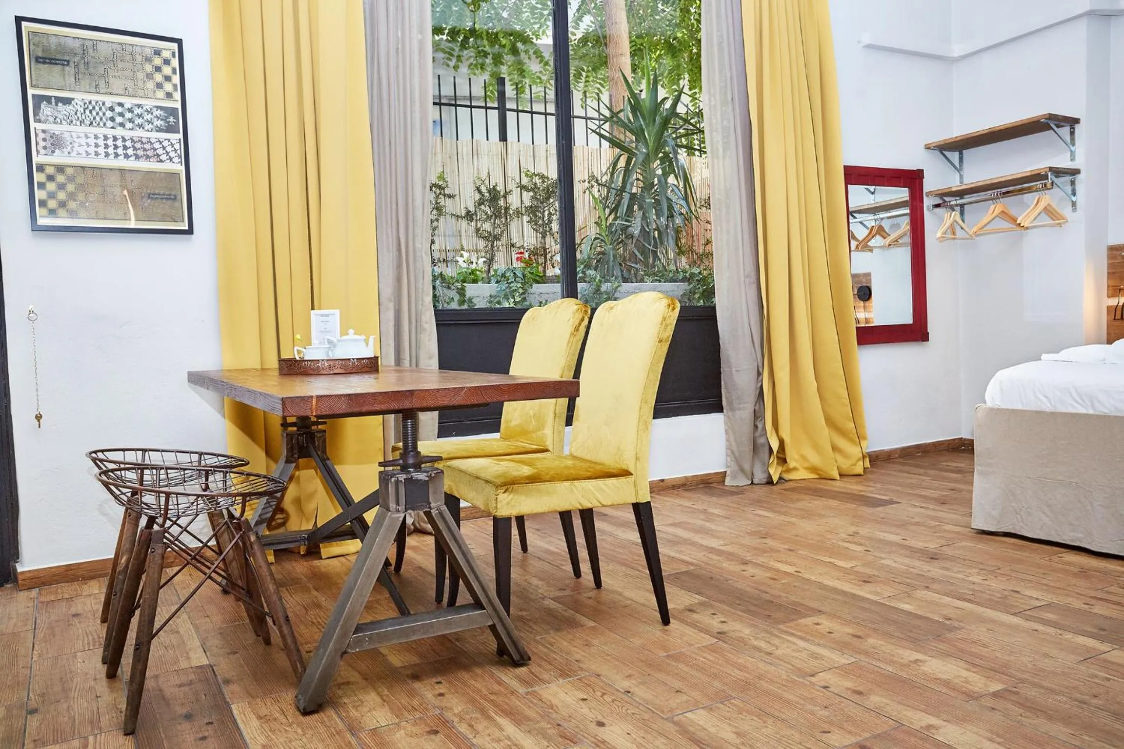 Bed in Aris Athens Suites