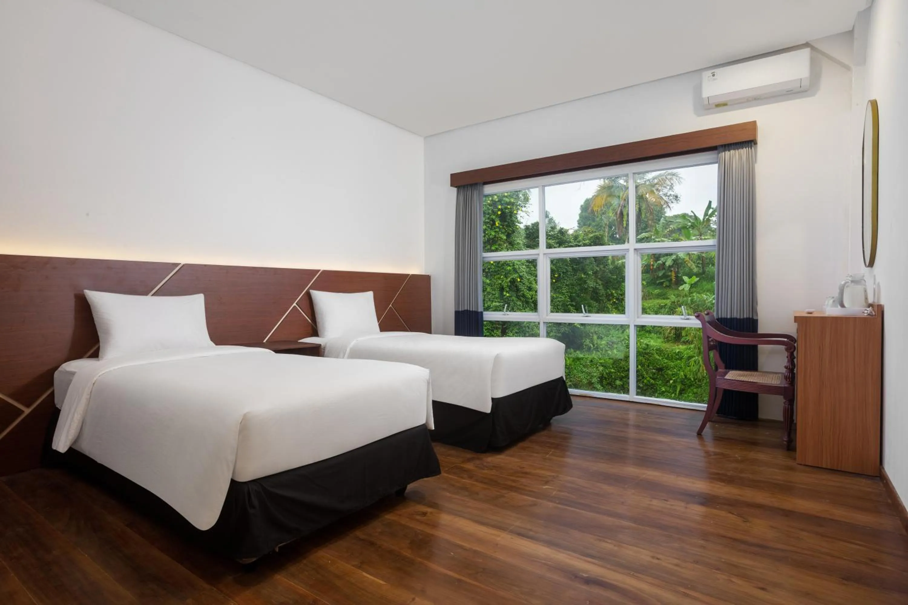 Bed in Casa de Lani Resort & Convention