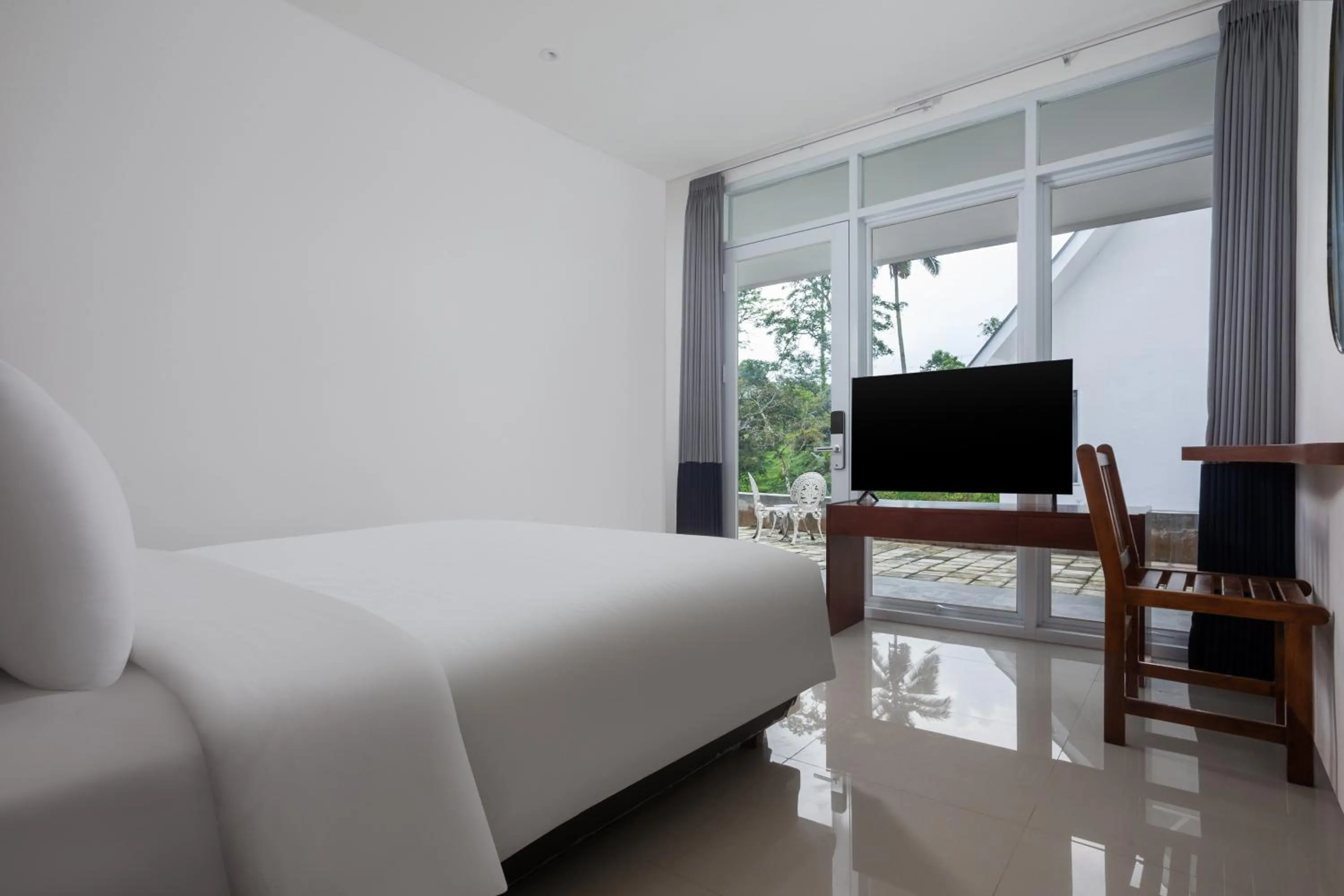 Bed in Casa de Lani Resort & Convention