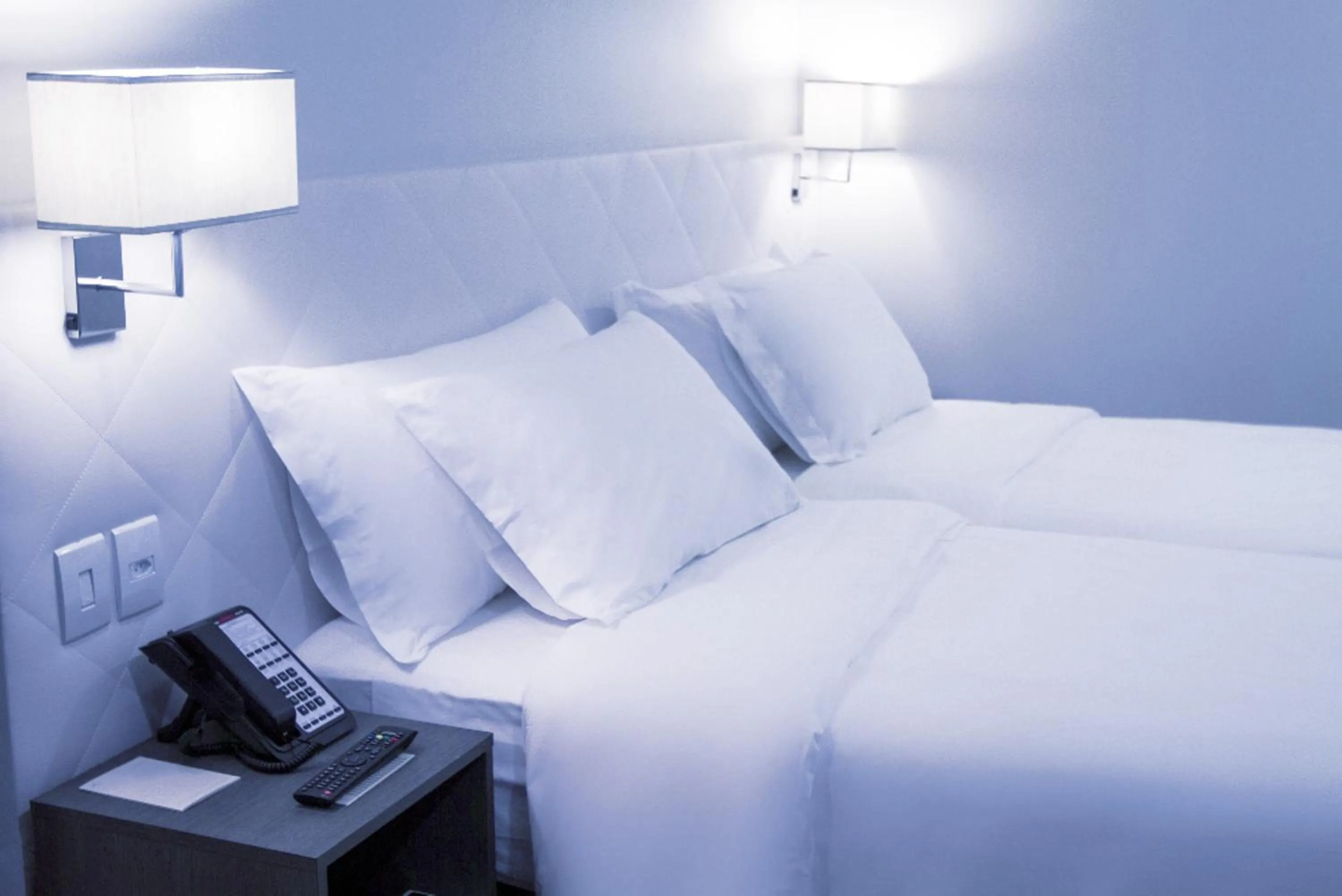 Bed in Fratele Business Hotel