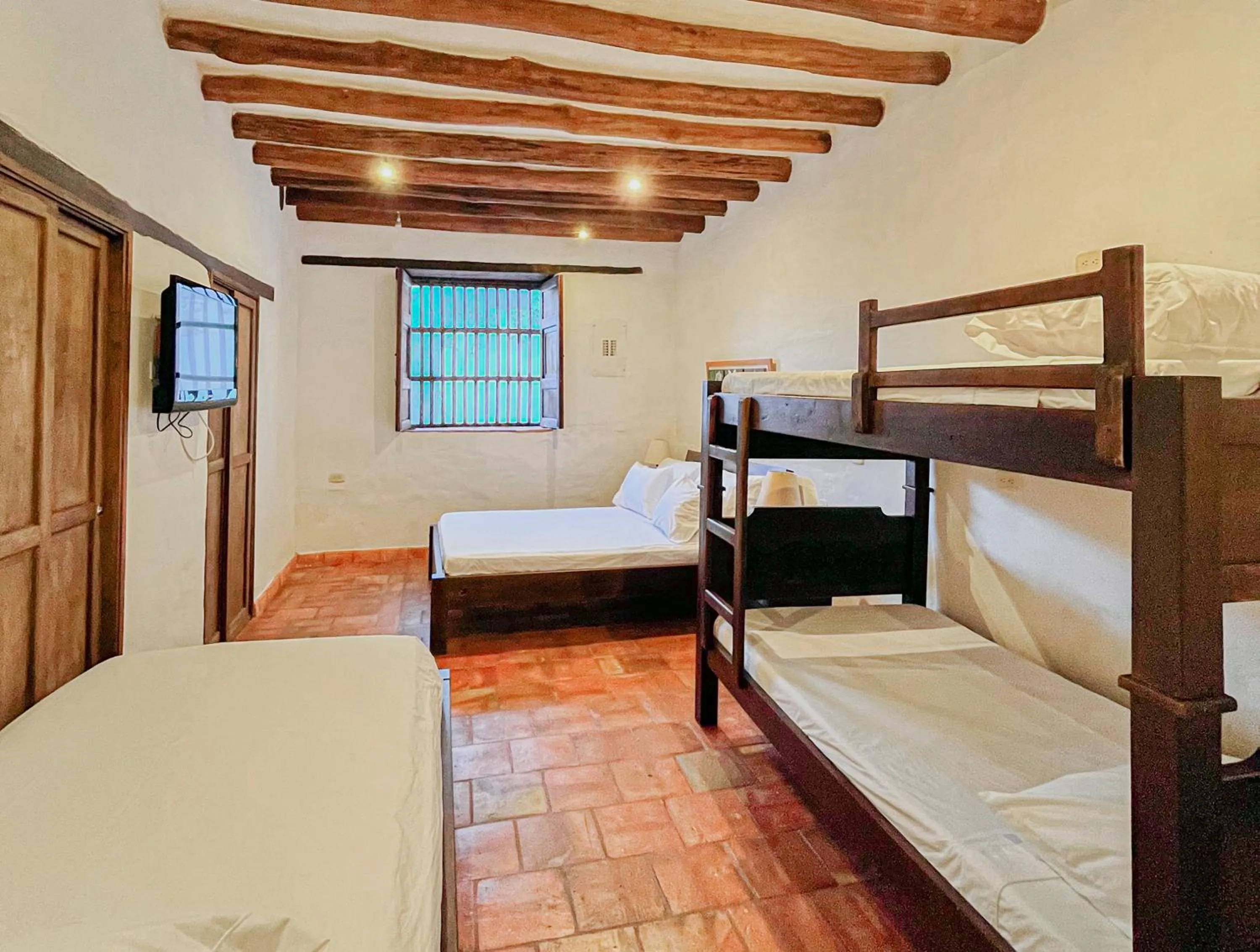 Photo of the whole room, Bed in Achiotte by Masaya Collection