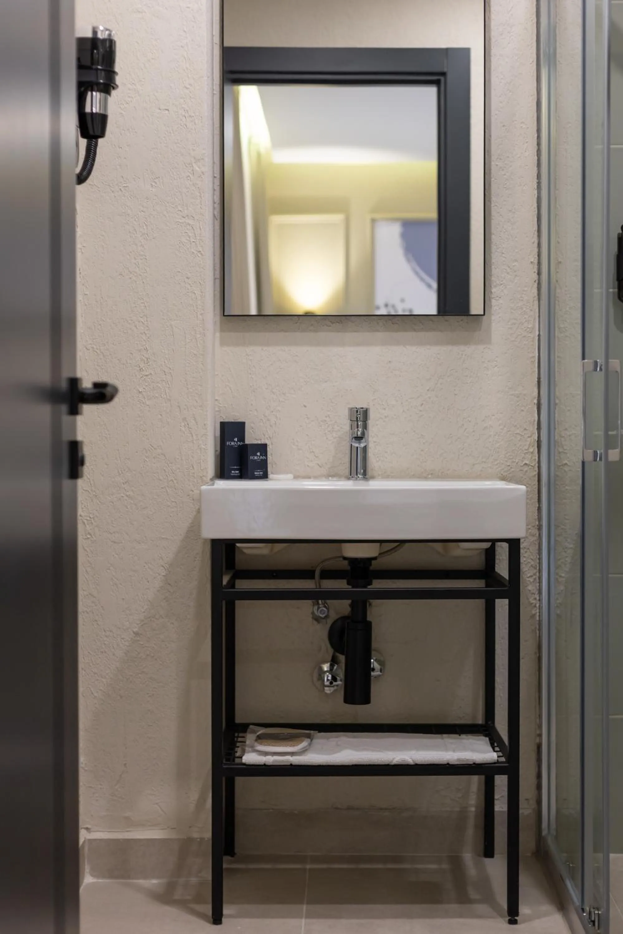 Bathroom in Fora Inn Lara