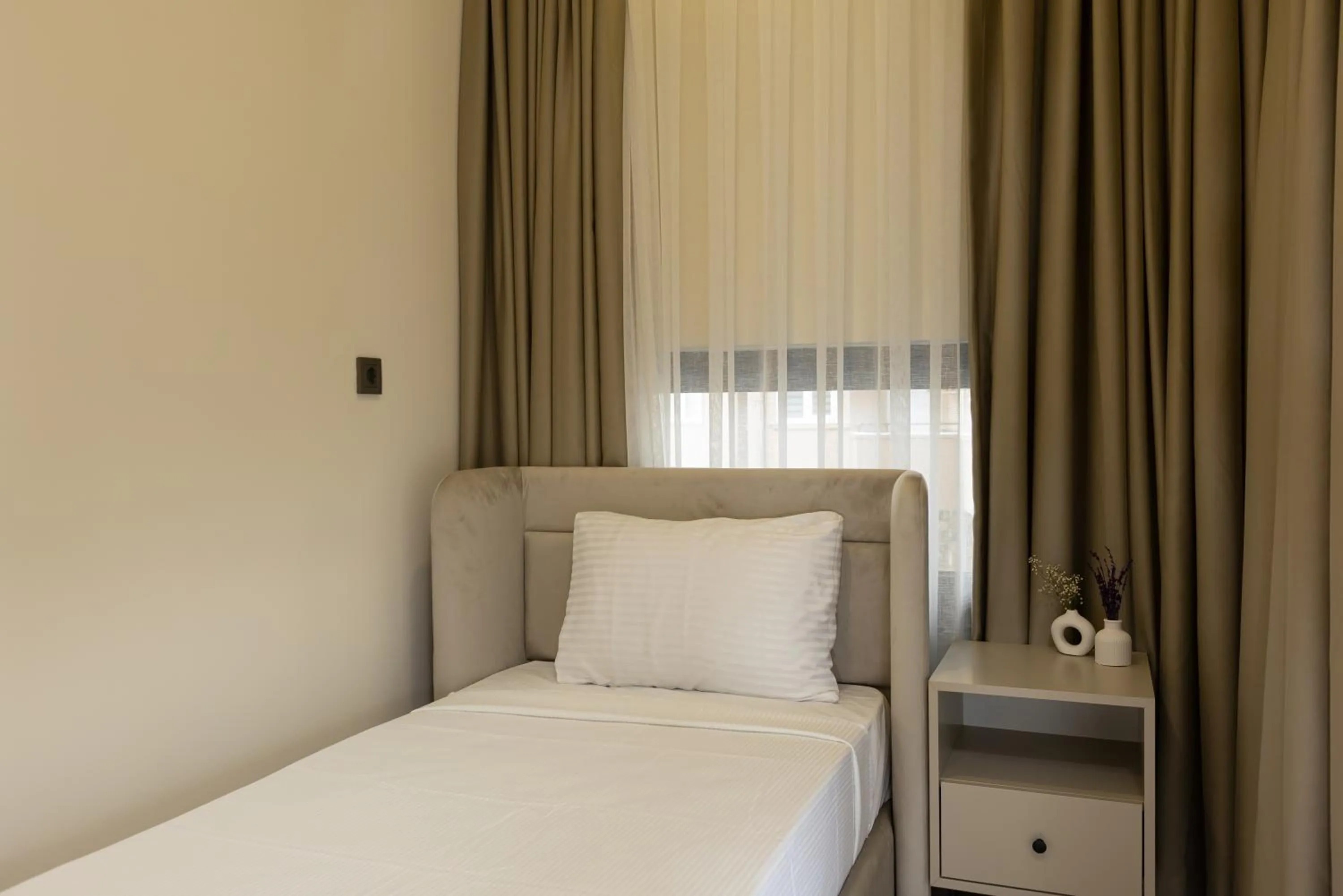 Bed in Fora Inn Lara