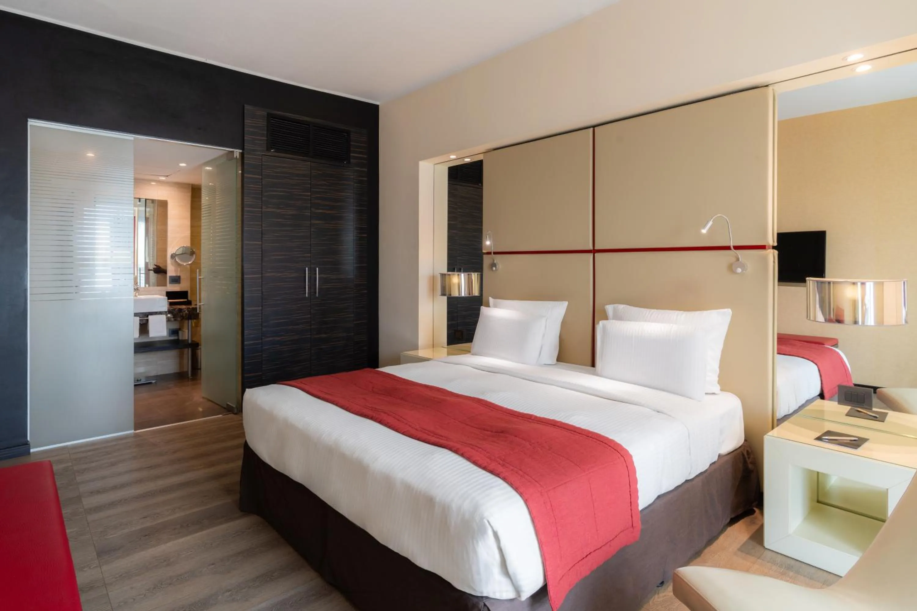 Photo of the whole room, Bed in Pullman Kinshasa Grand Hotel