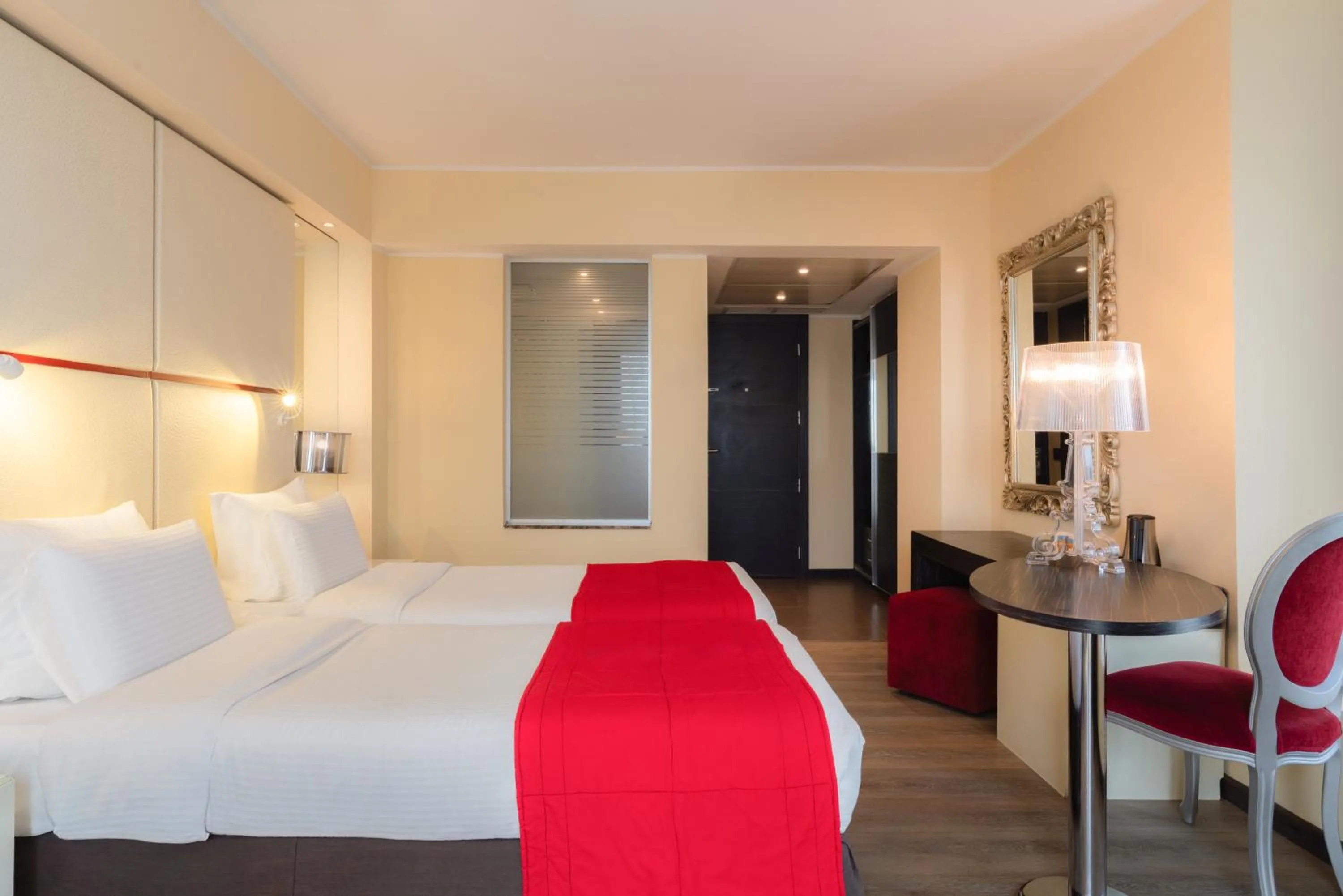 Bed in Pullman Kinshasa Grand Hotel