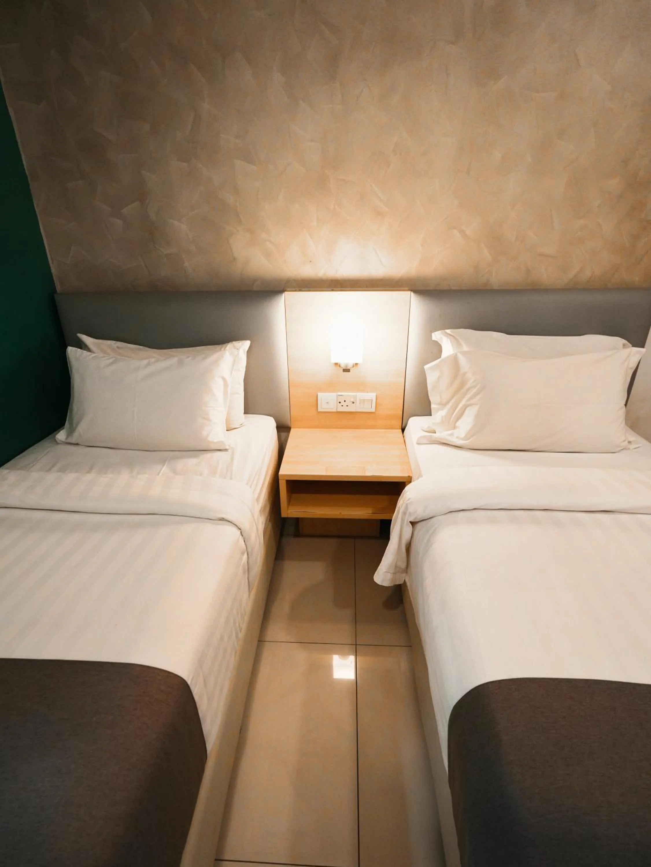 Bed in Eco Roomy Hotel