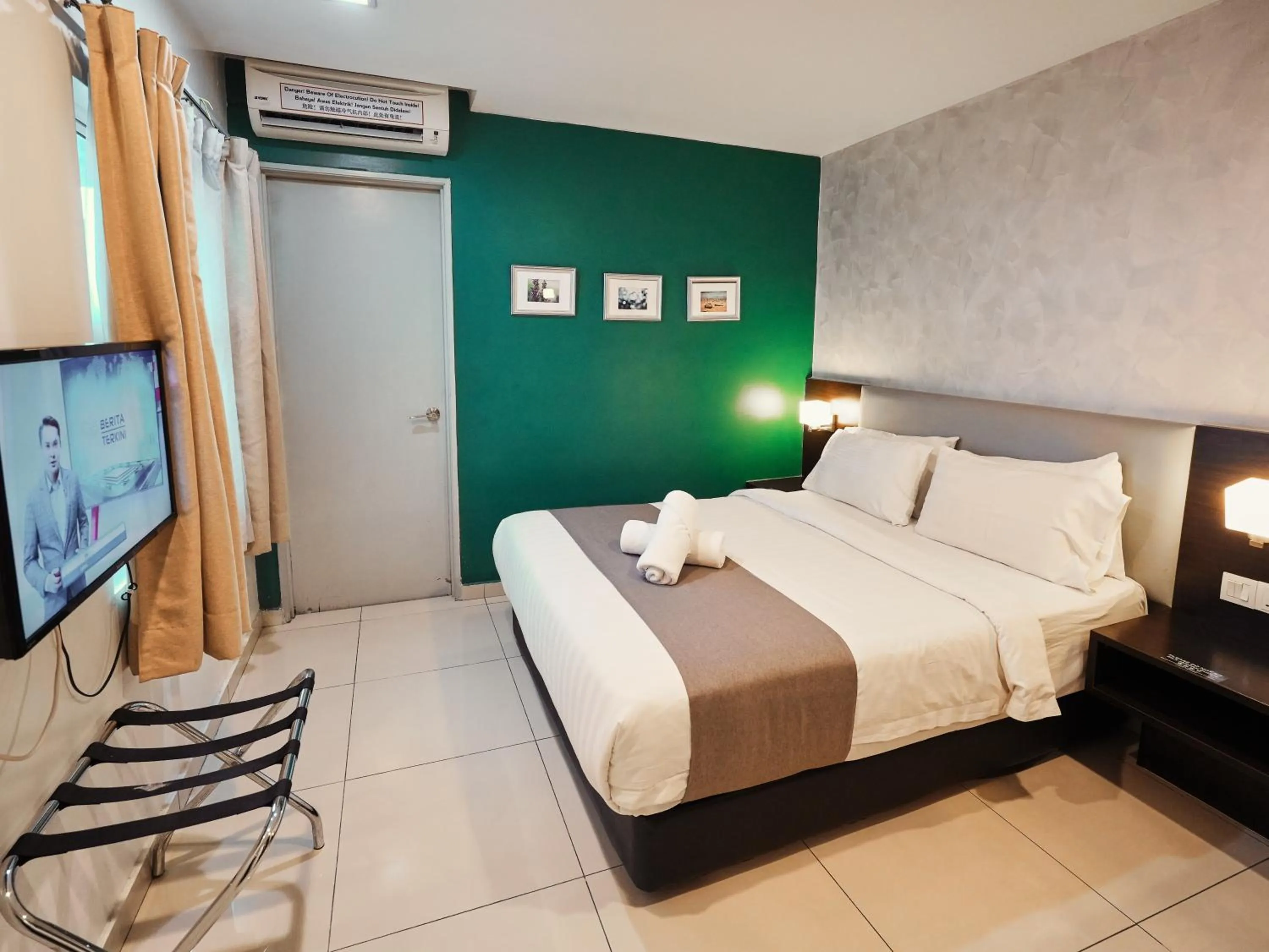 Bed in Eco Roomy Hotel