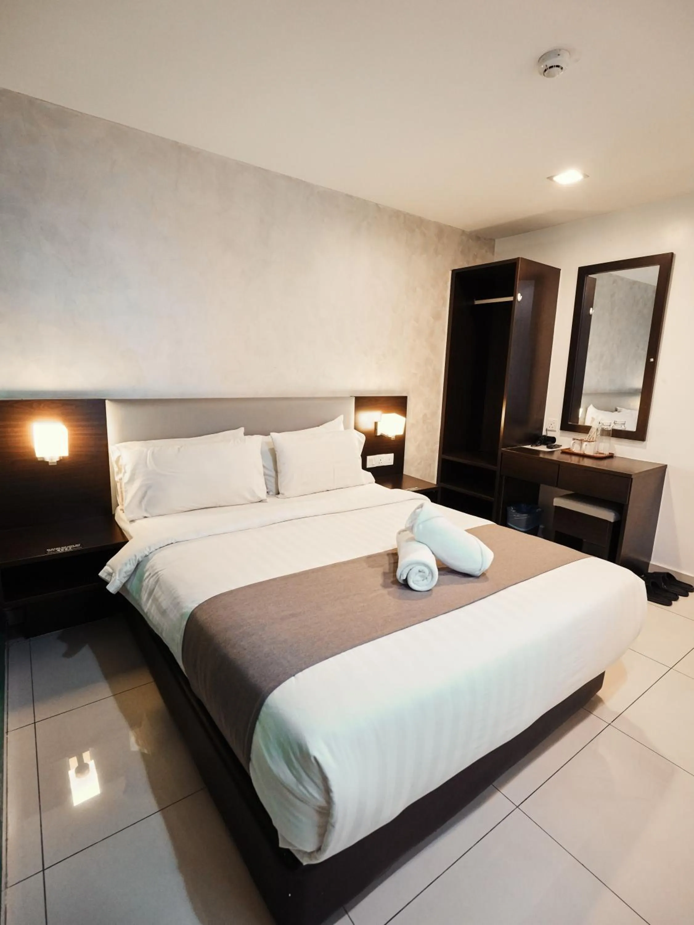 Bed in Eco Roomy Hotel