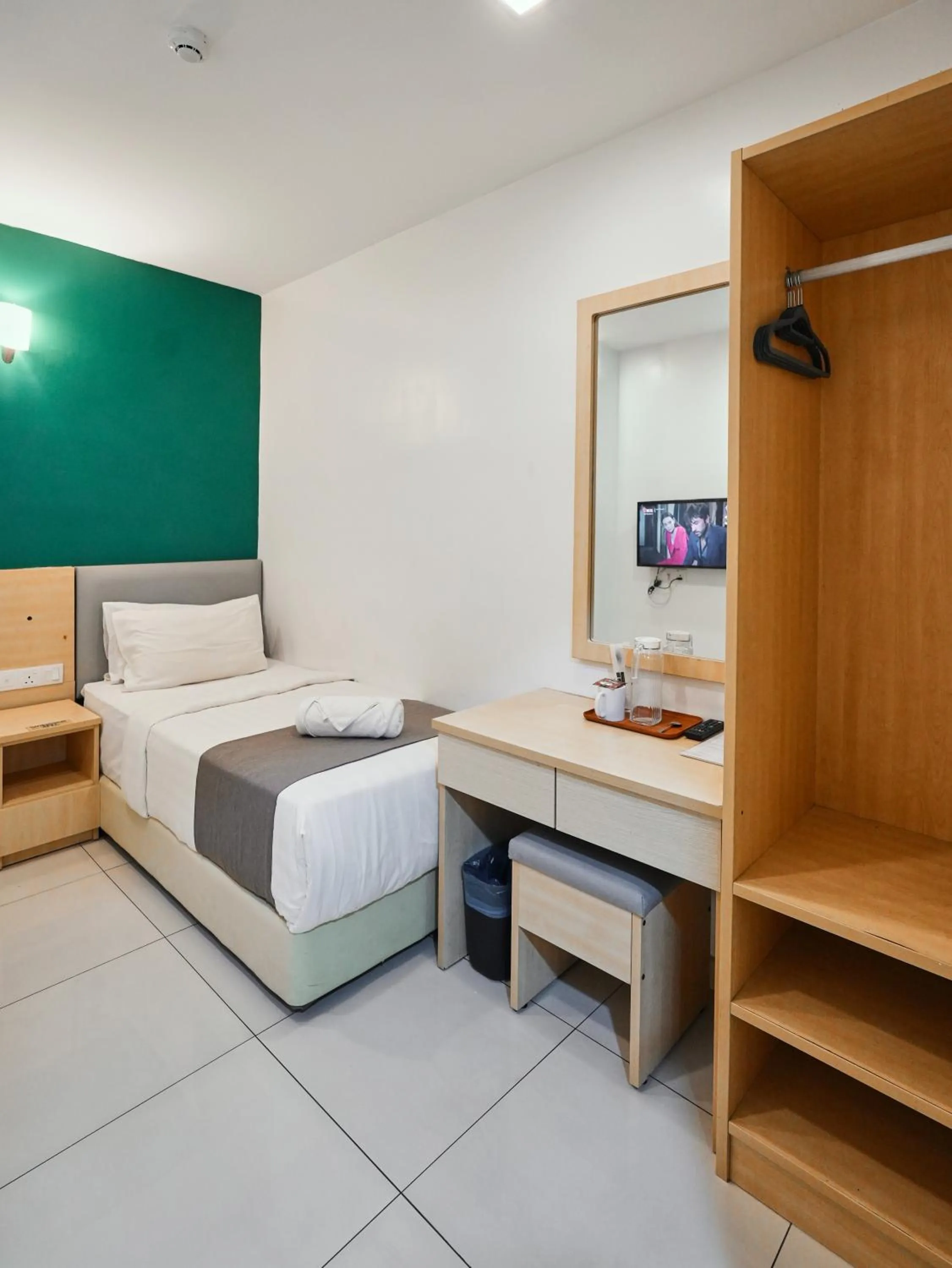 Bed in Eco Roomy Hotel