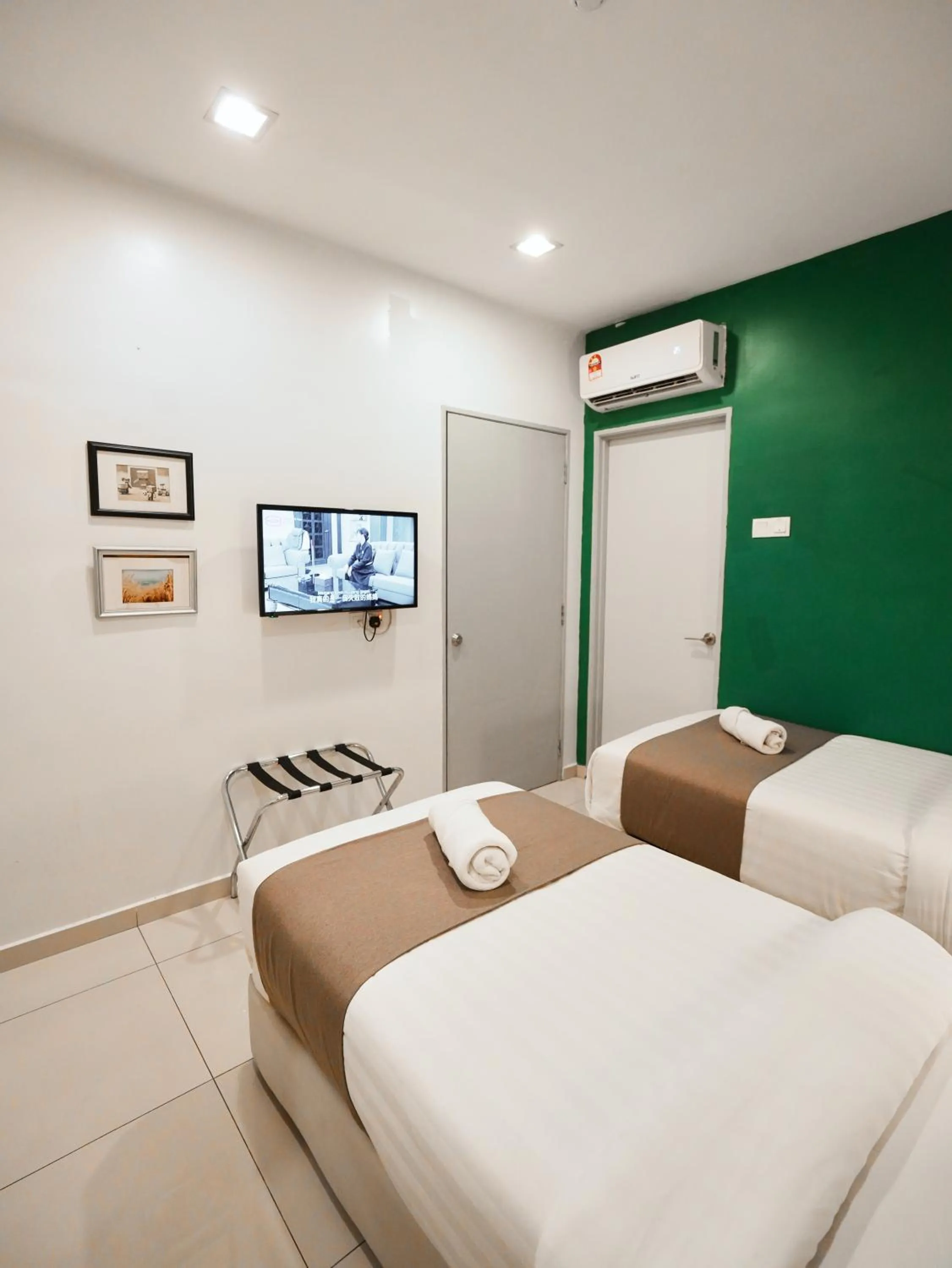 Bed in Eco Roomy Hotel