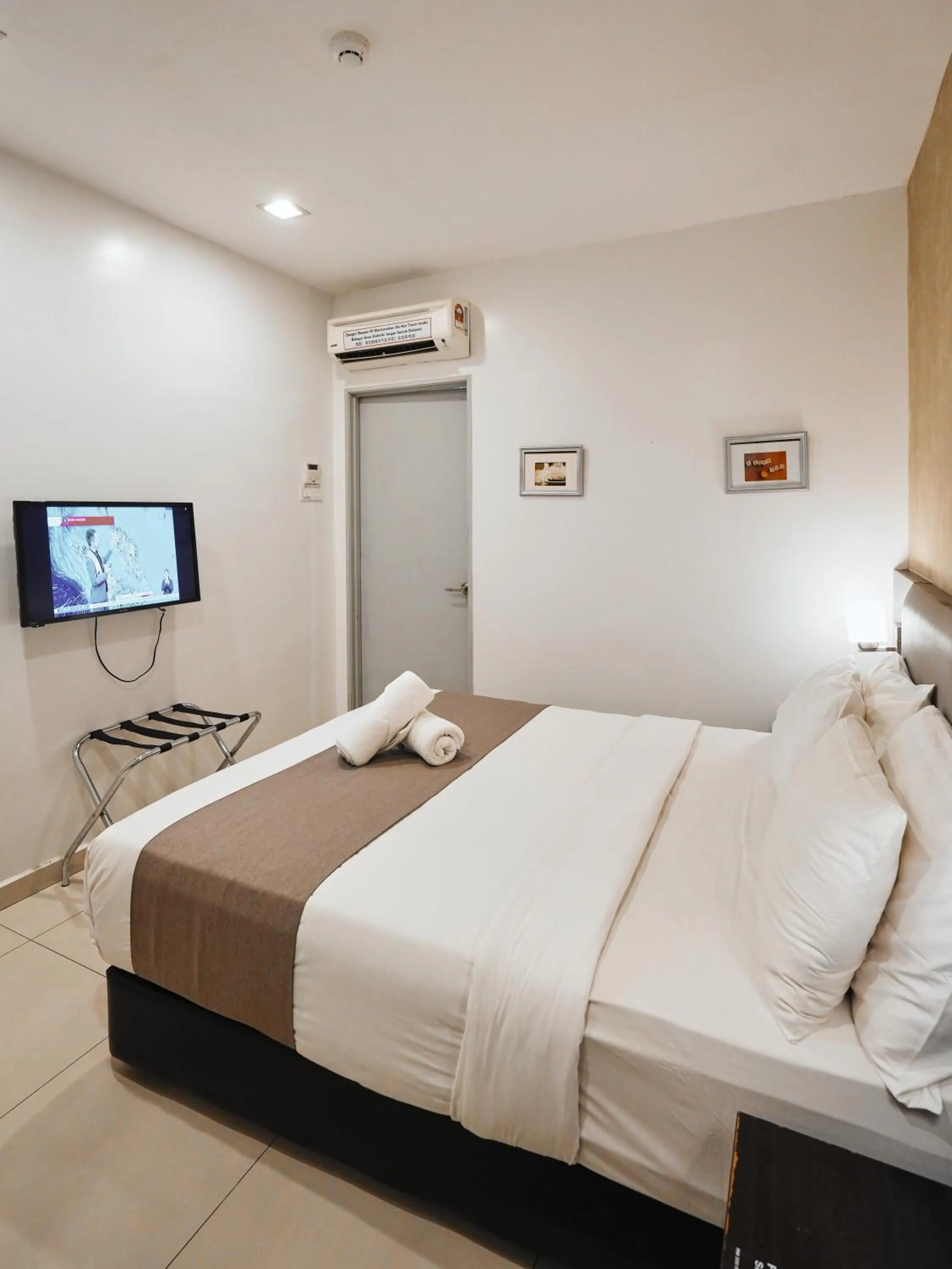 Bed in Eco Roomy Hotel