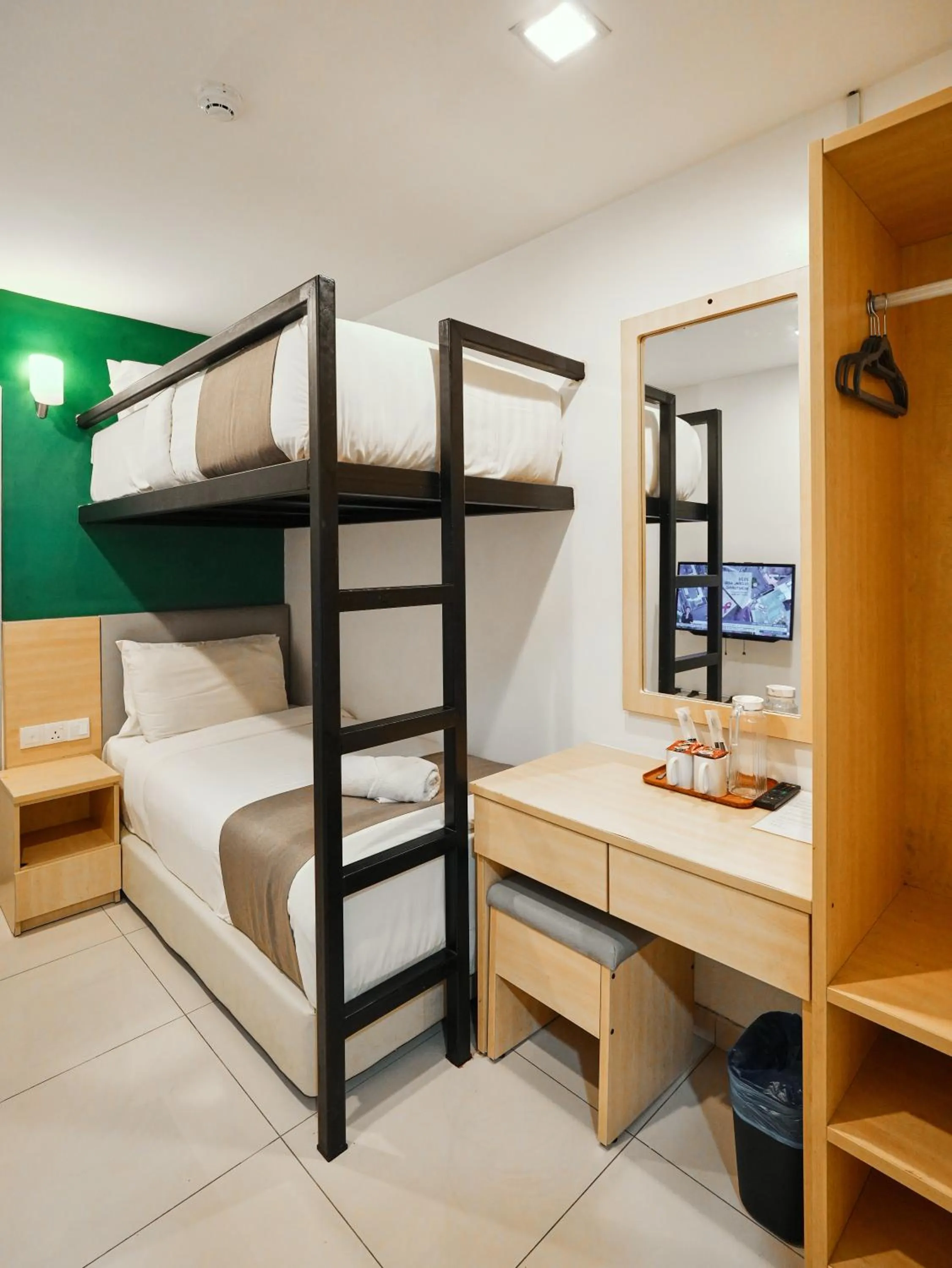 Bed in Eco Roomy Hotel