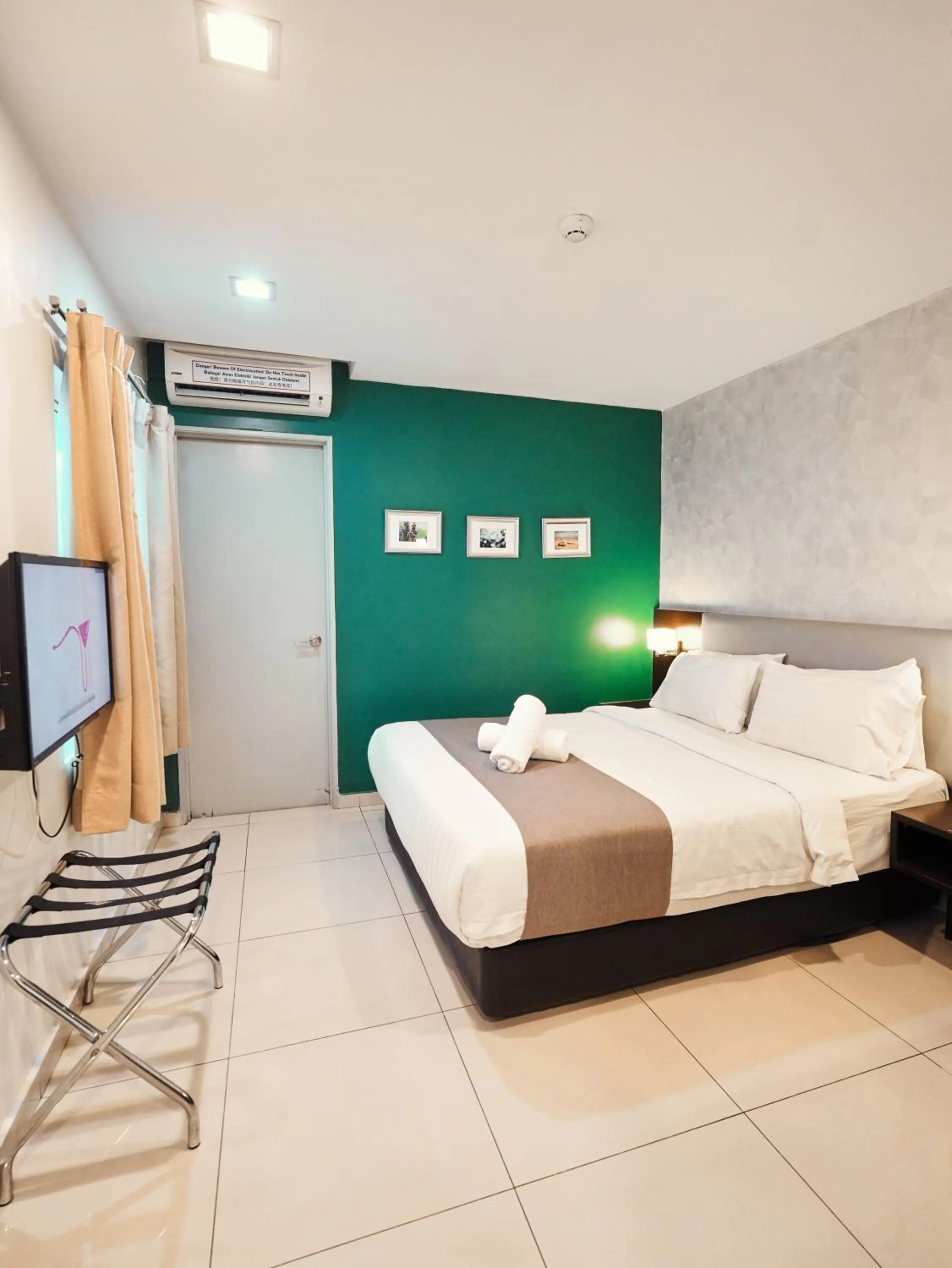 Bed in Eco Roomy Hotel