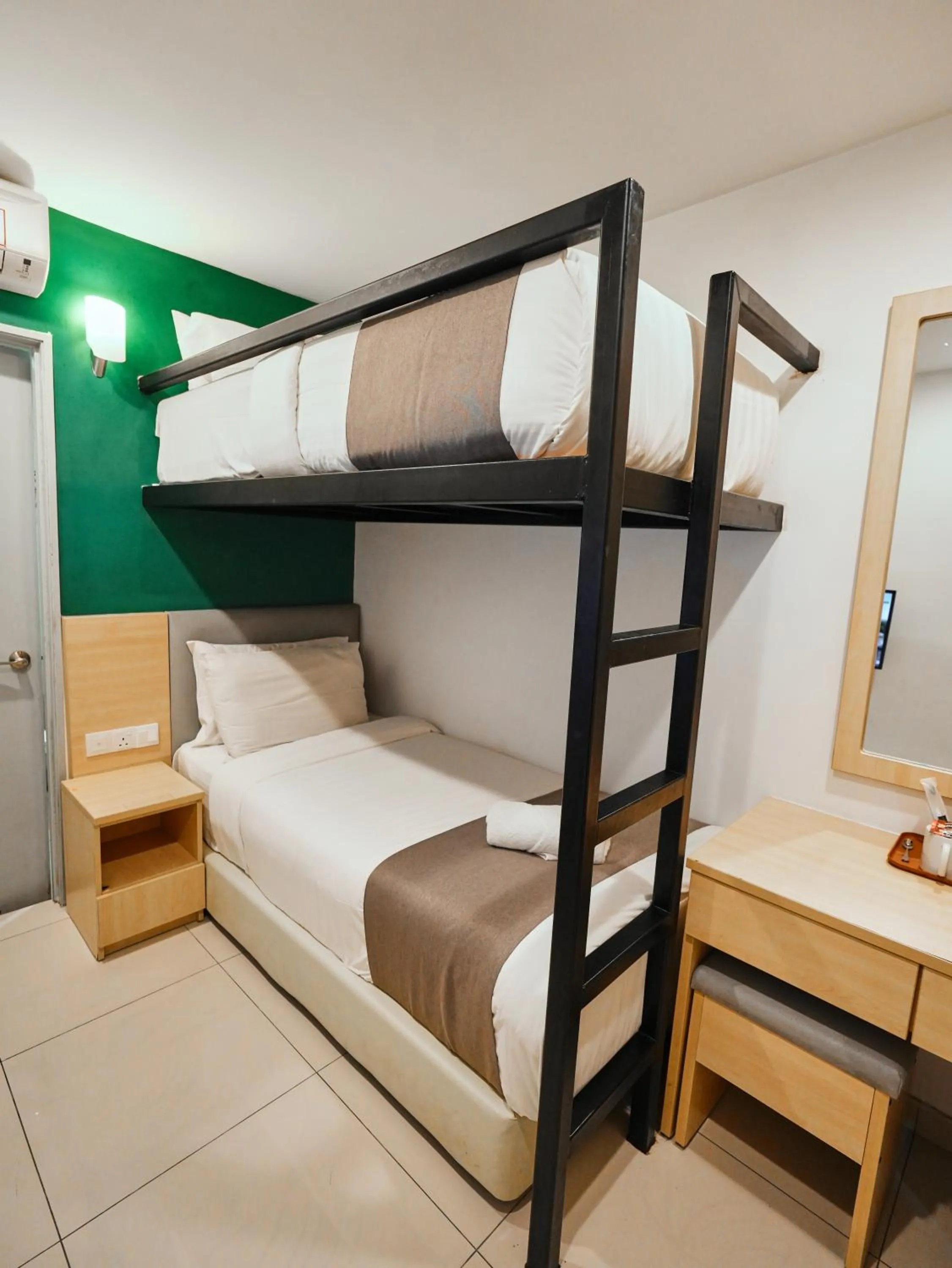 Bed in Eco Roomy Hotel