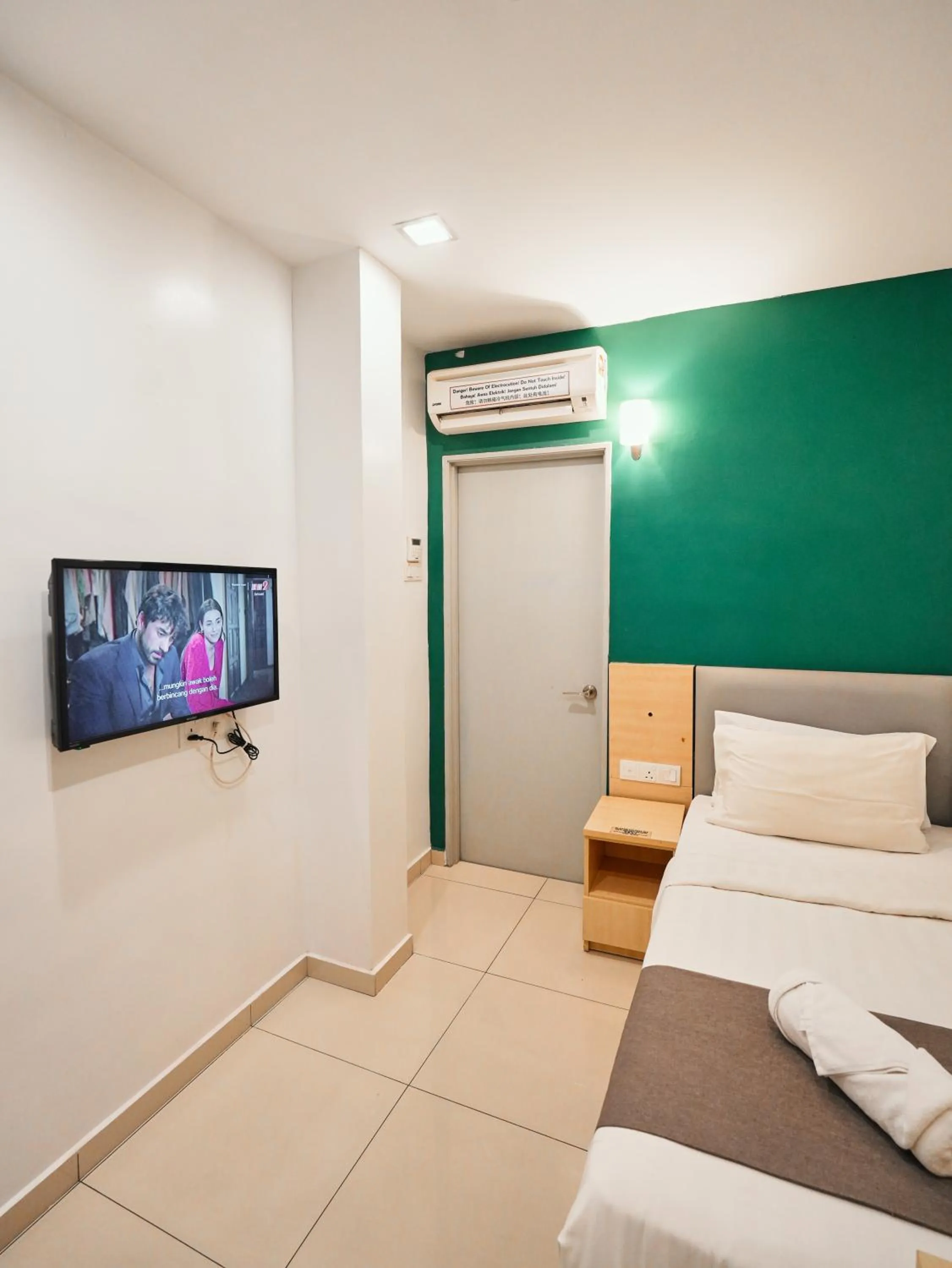 Bed in Eco Roomy Hotel